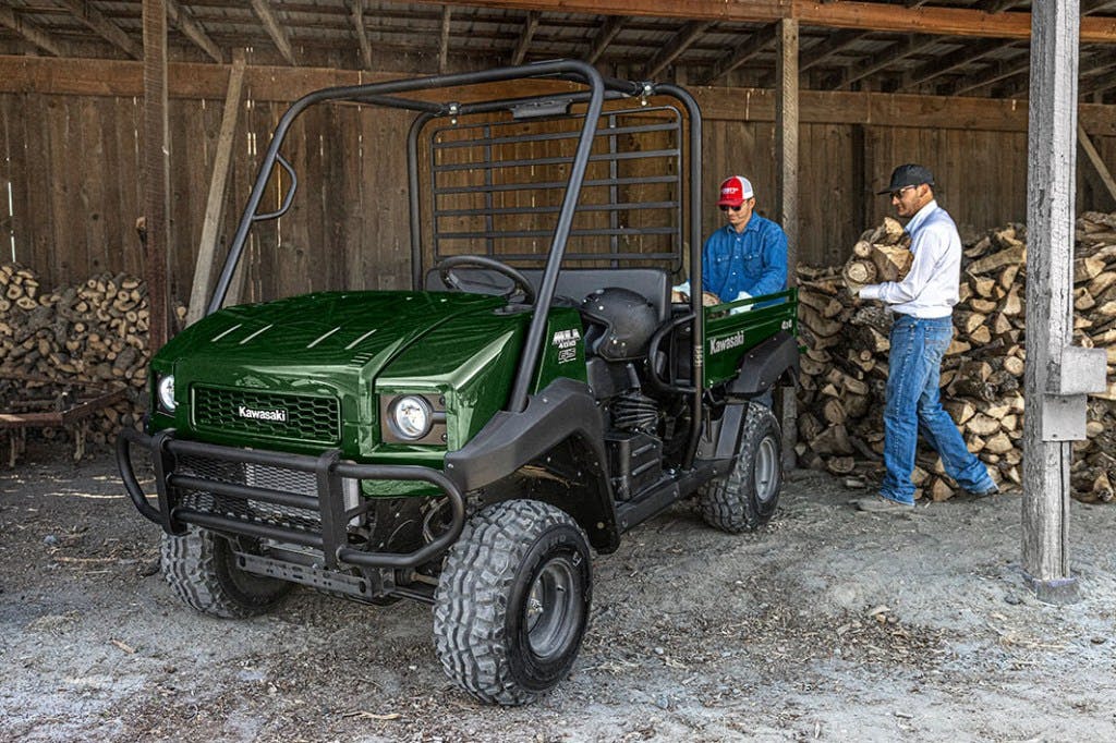 2024 Kawasaki Mule 4010 being loaded with firewood.