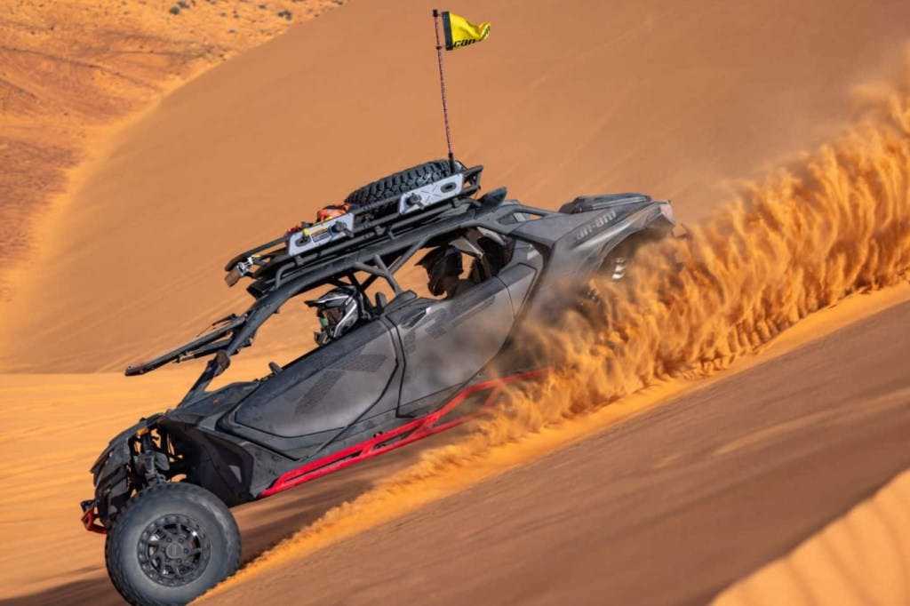 Can-Am Maverick R Max drifting through sane dunes.