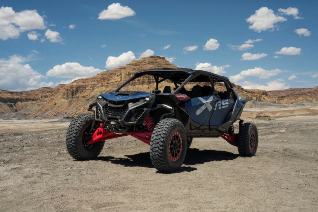 2025 Can-Am Maverick R Max X RS with Smart-Shox sitting in desert valley.