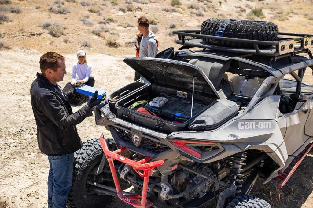 Can-Am Maverick R Max X being loaded with gear.