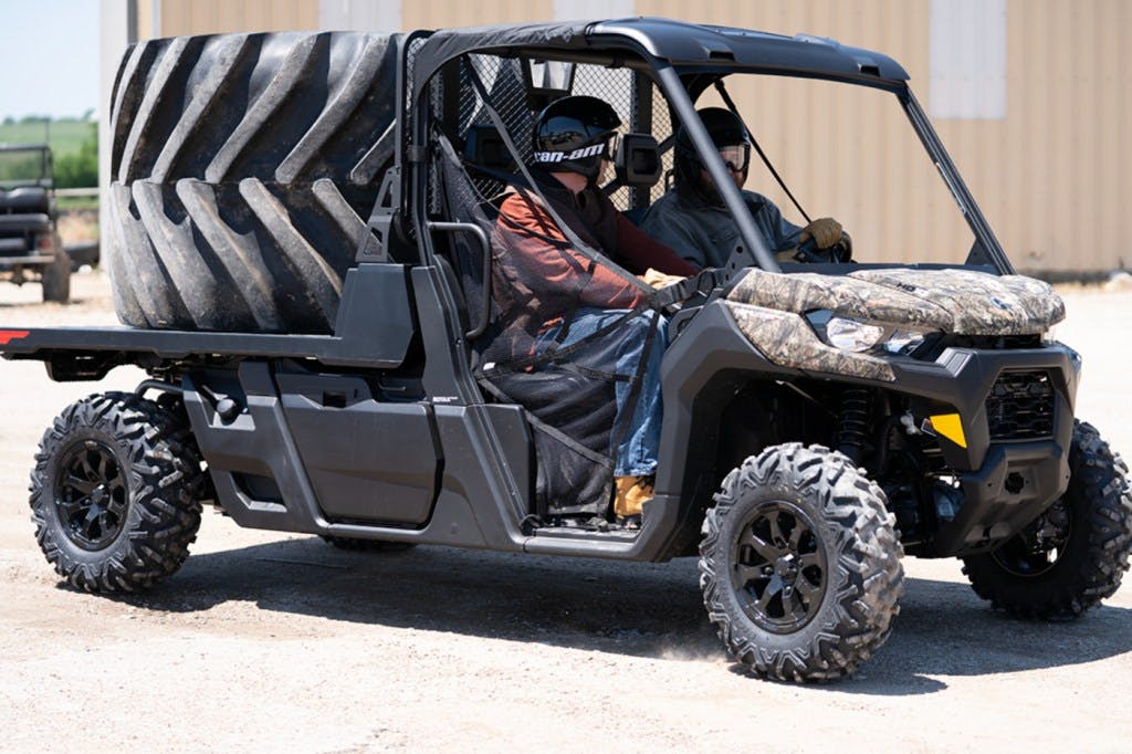 2025 can-am defender pro hauling a professional grade crossfit tire