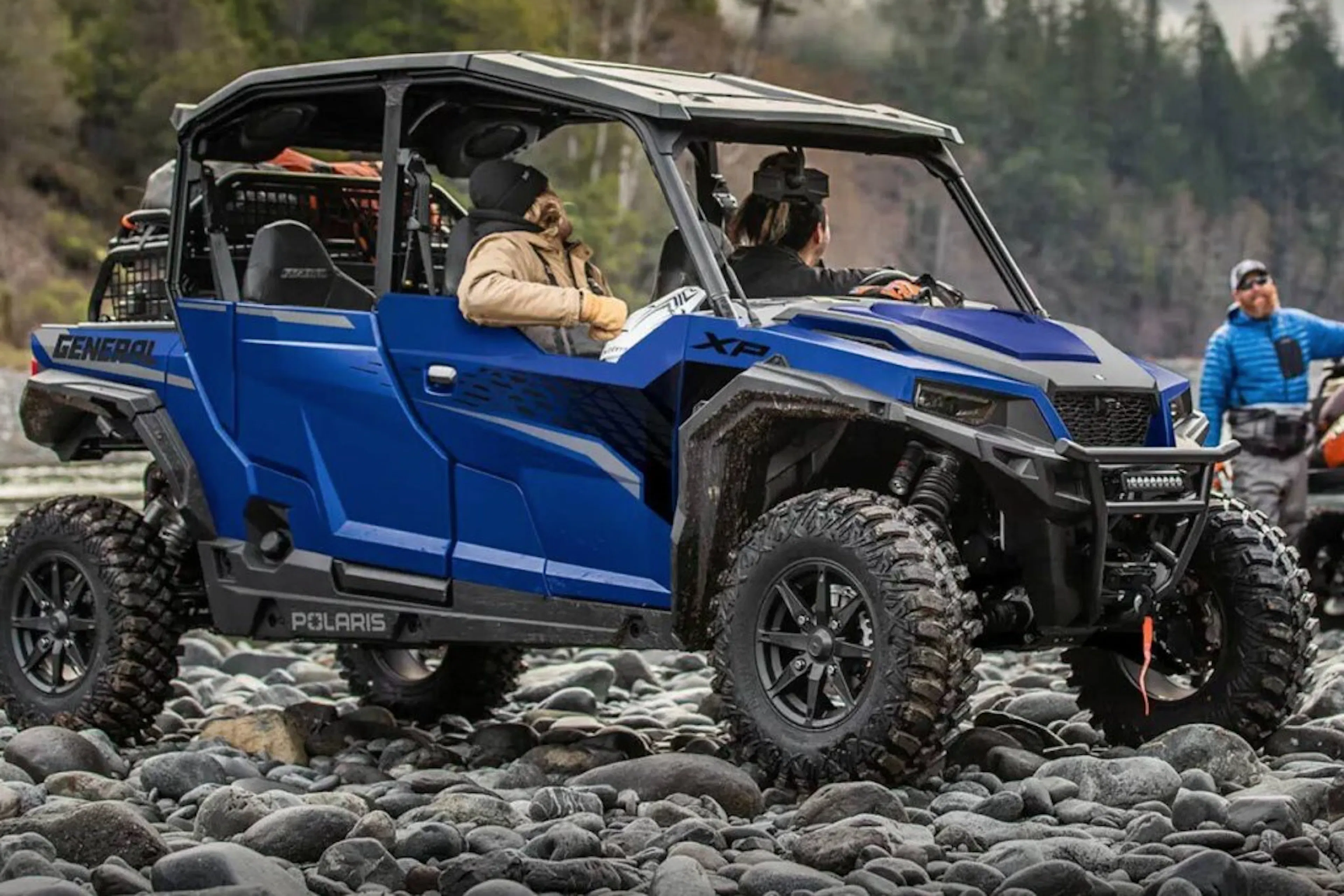 2024 polaris general xp 1000 parked on rocks