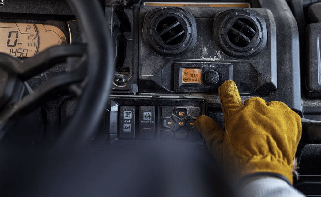 2025 Can-Am Defender interior HVAC controls AC and heat buttons
