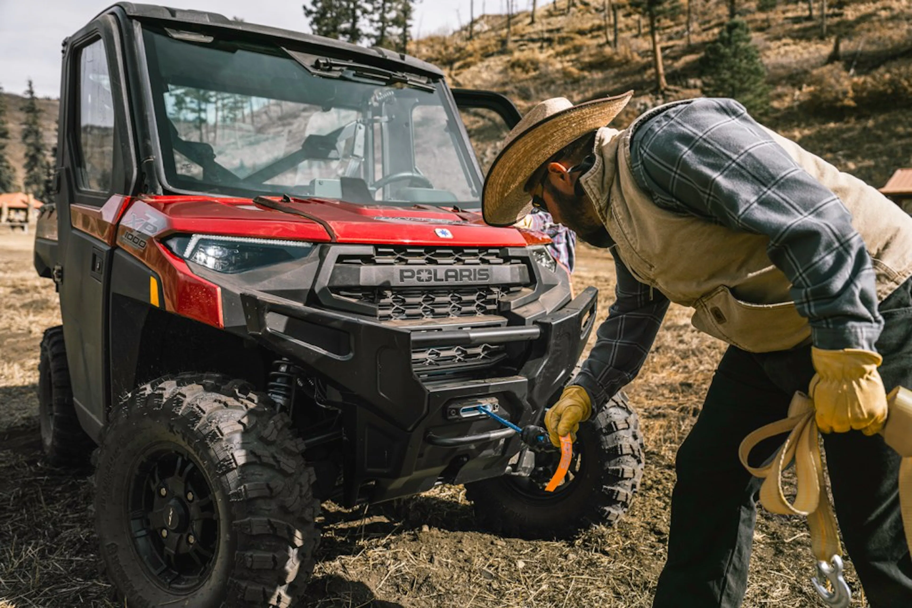 2025 Polaris Ranger XP 1000 Northstar Premium winch doing work farm backcountry