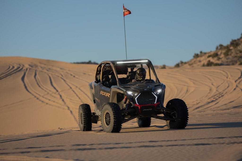 2025 Polaris RZR Pro R parked in sand dunes