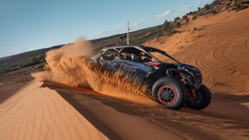 2025 Can-Am Maverick R in sand dunes sliding
