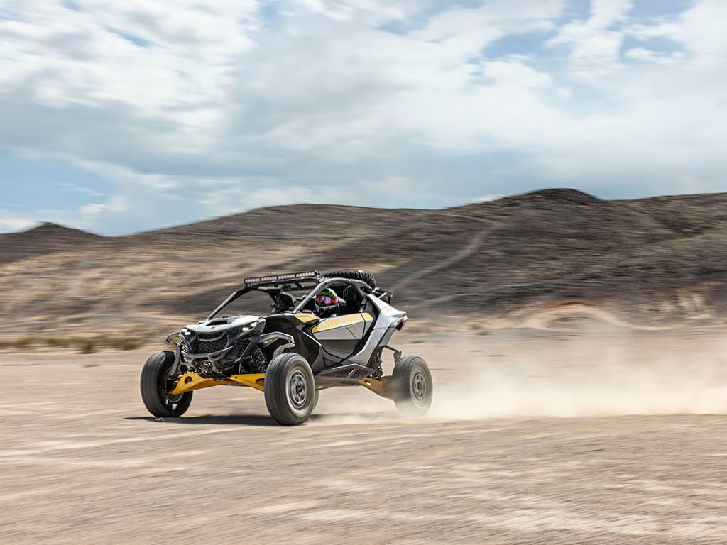 2025 Can-Am Maverick R at speed in the desert.