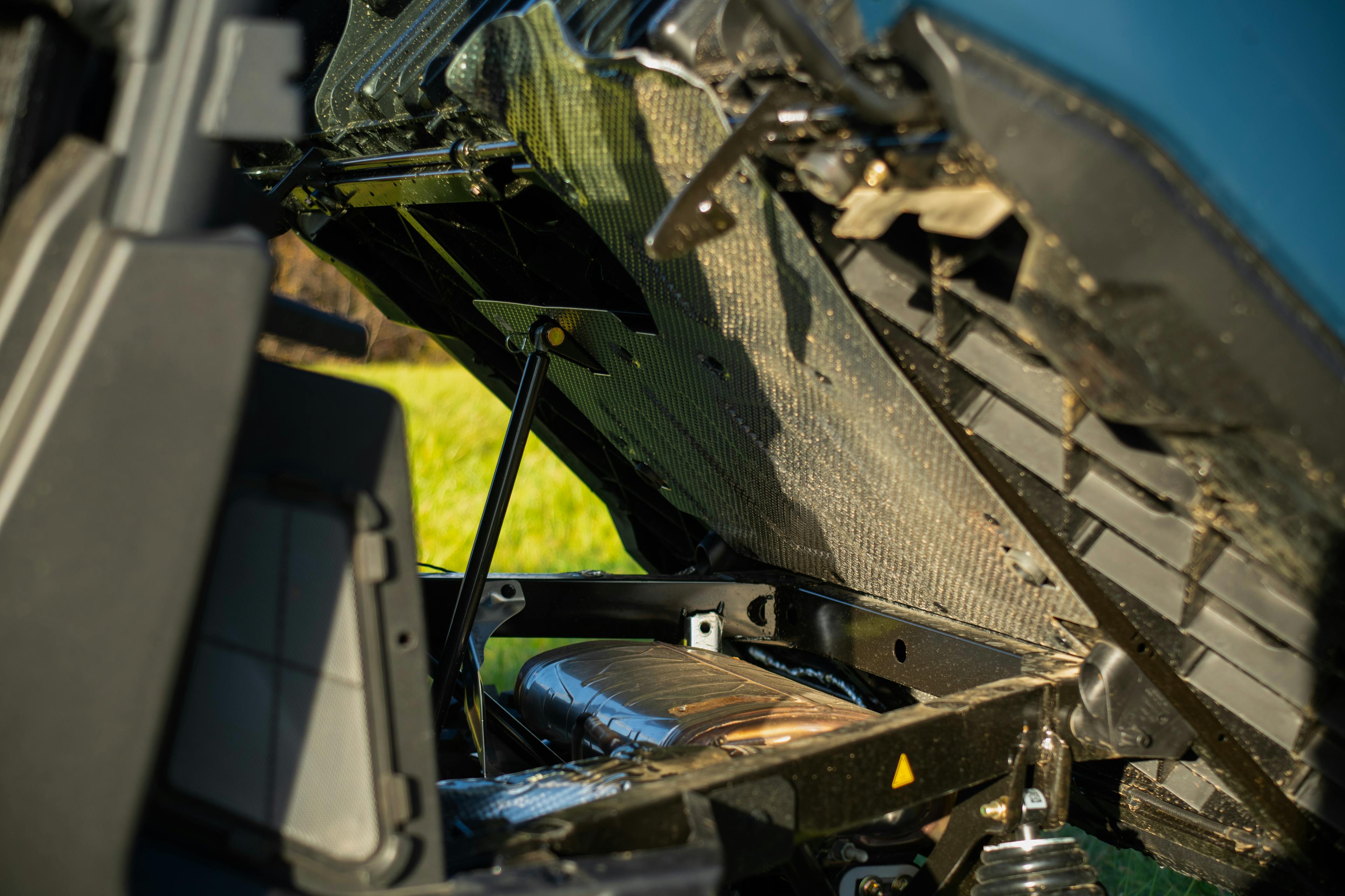 2025 Can-Am Defender Max XT HD10 engine/muffler wide