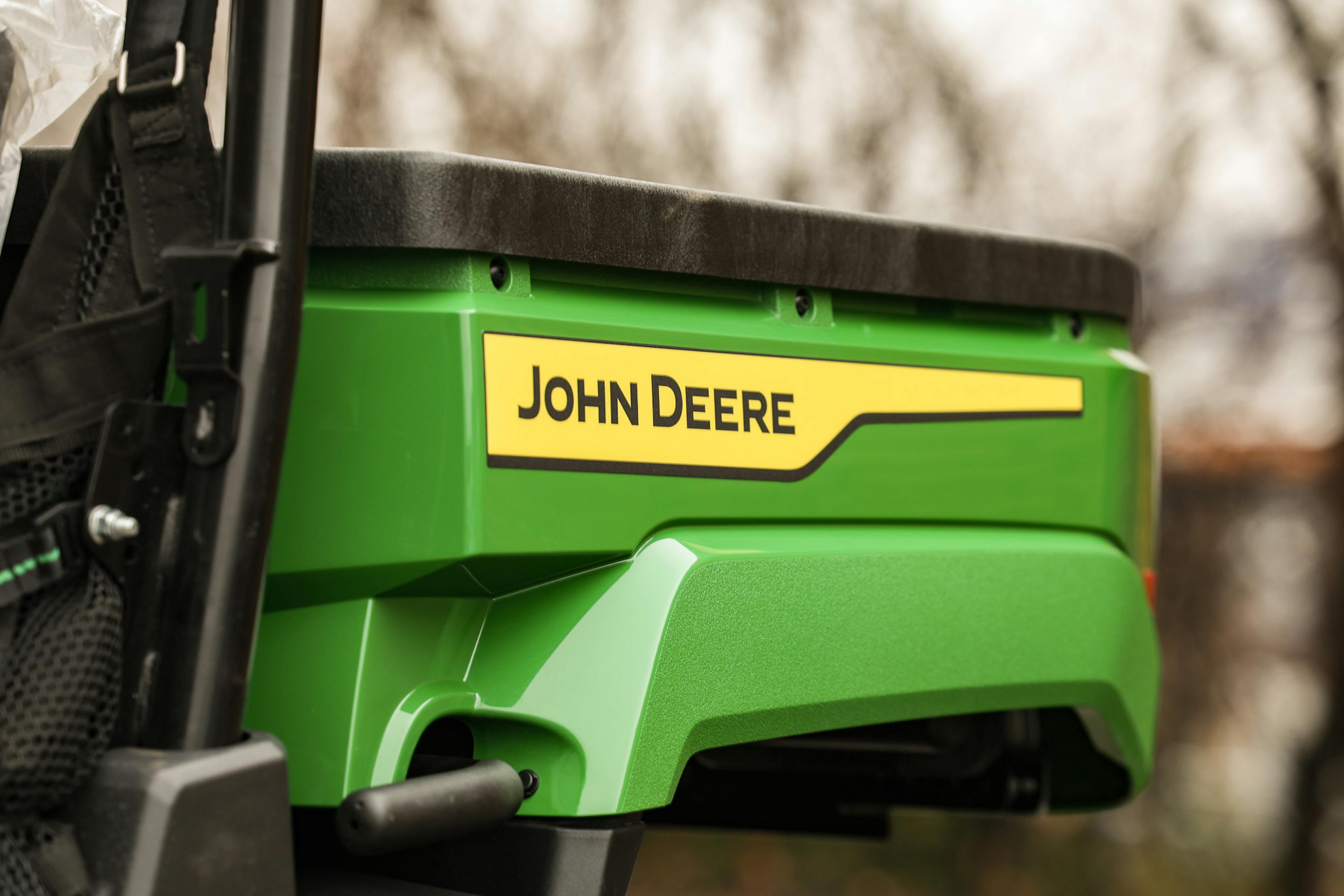 2025 John Deere Gator XUV560E driver bed side