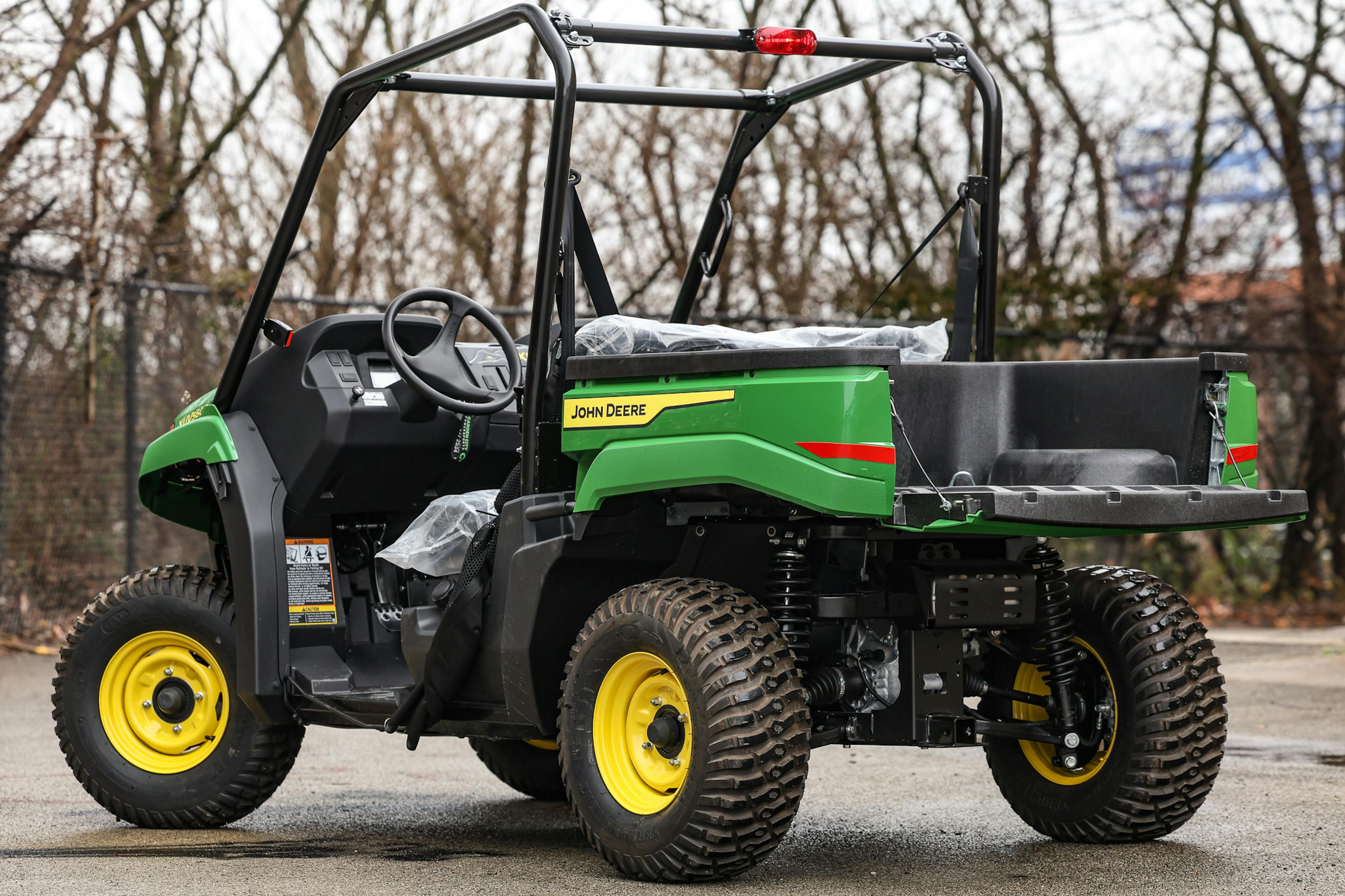 2025 John Deere Gator XUV560E driver rear 3/4 gate down