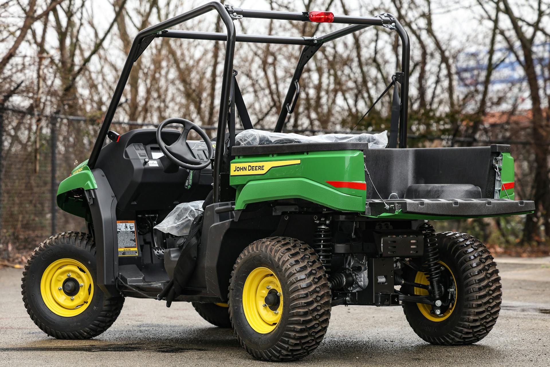 2025 John Deere Gator XUV560E driver rear 3/4 gate down