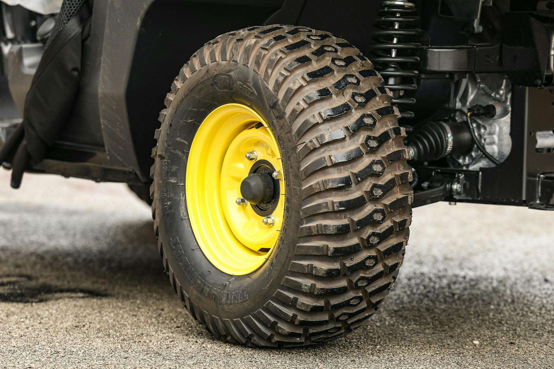 2025 John Deere Gator XUV560E driver rear tire