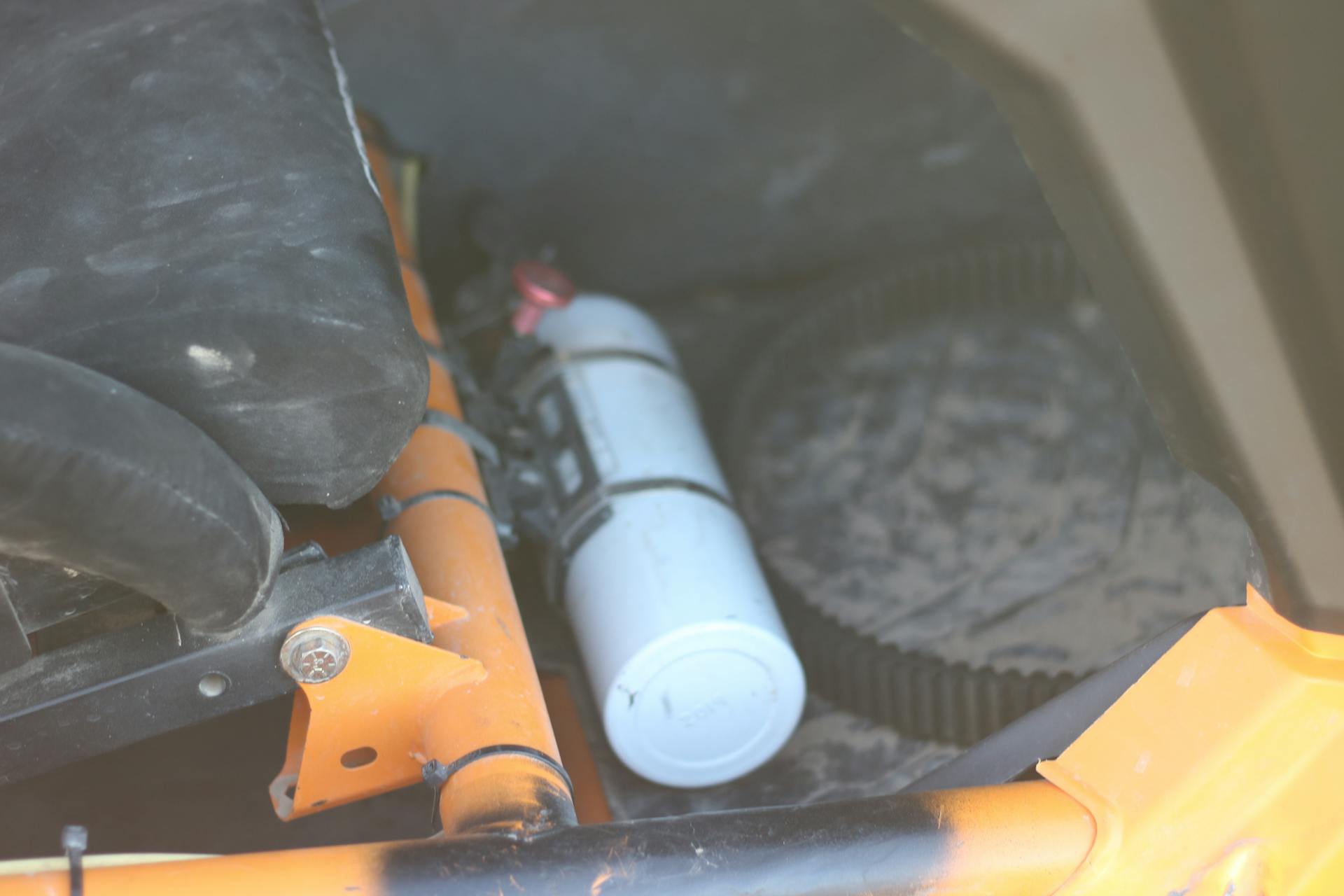 2020 Can-Am Maverick X3 X RC Turbo RR interior extinguisher/spare drive belt