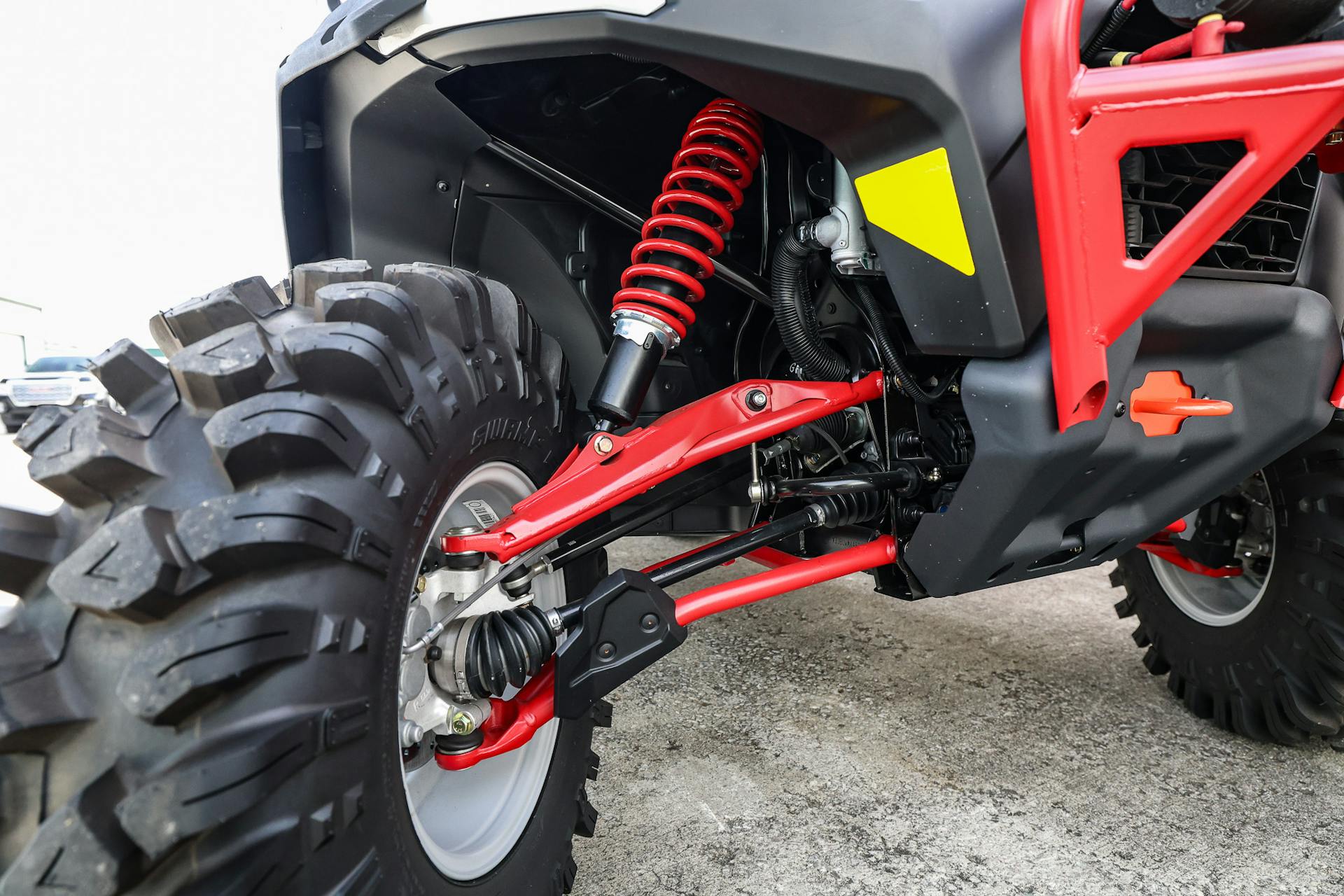 2024 Can-Am Defender HD10 XMR passenger front suspension detail