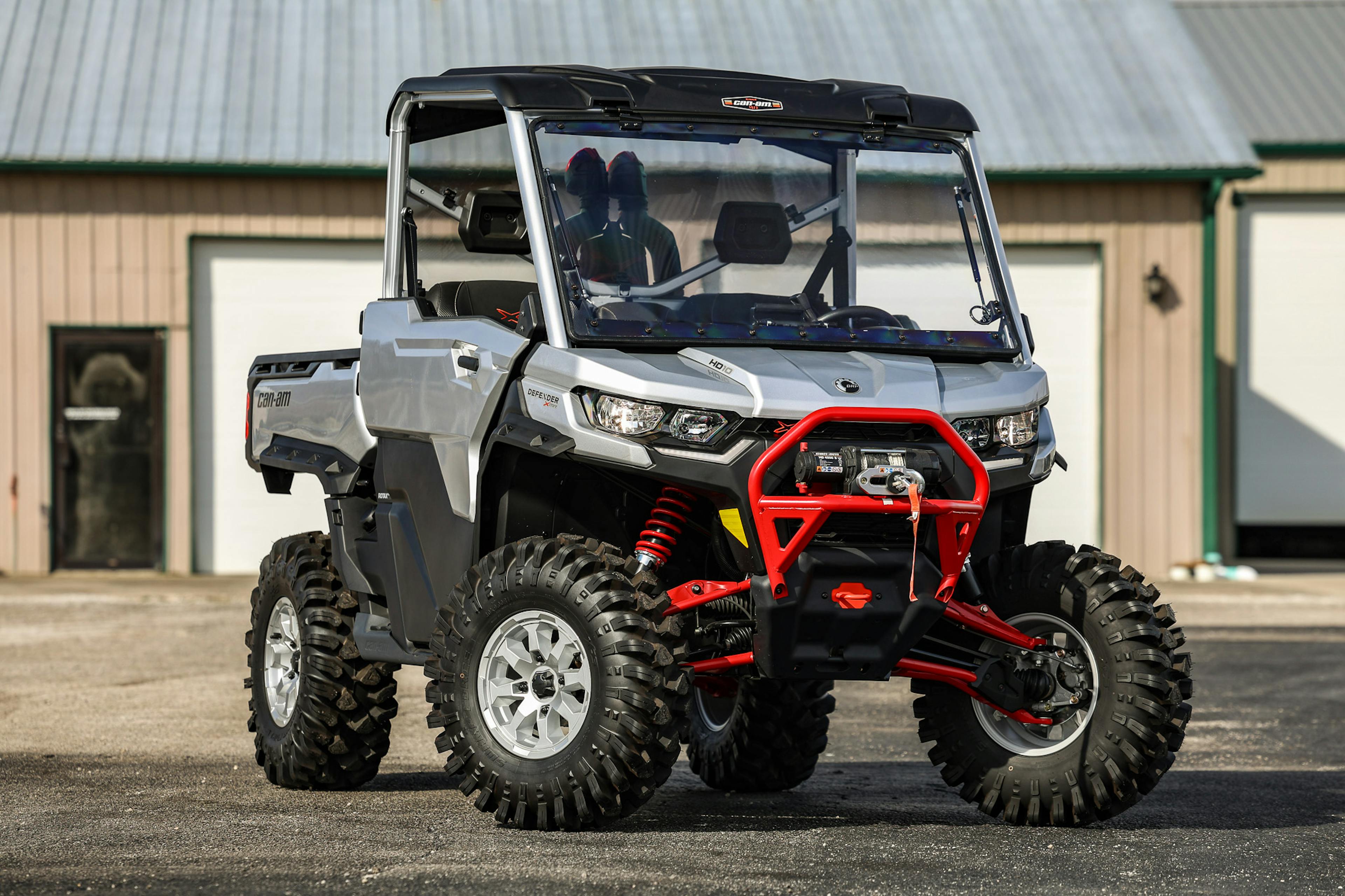 2024 Can-Am Defender HD10 XMR passenger front 3/4
