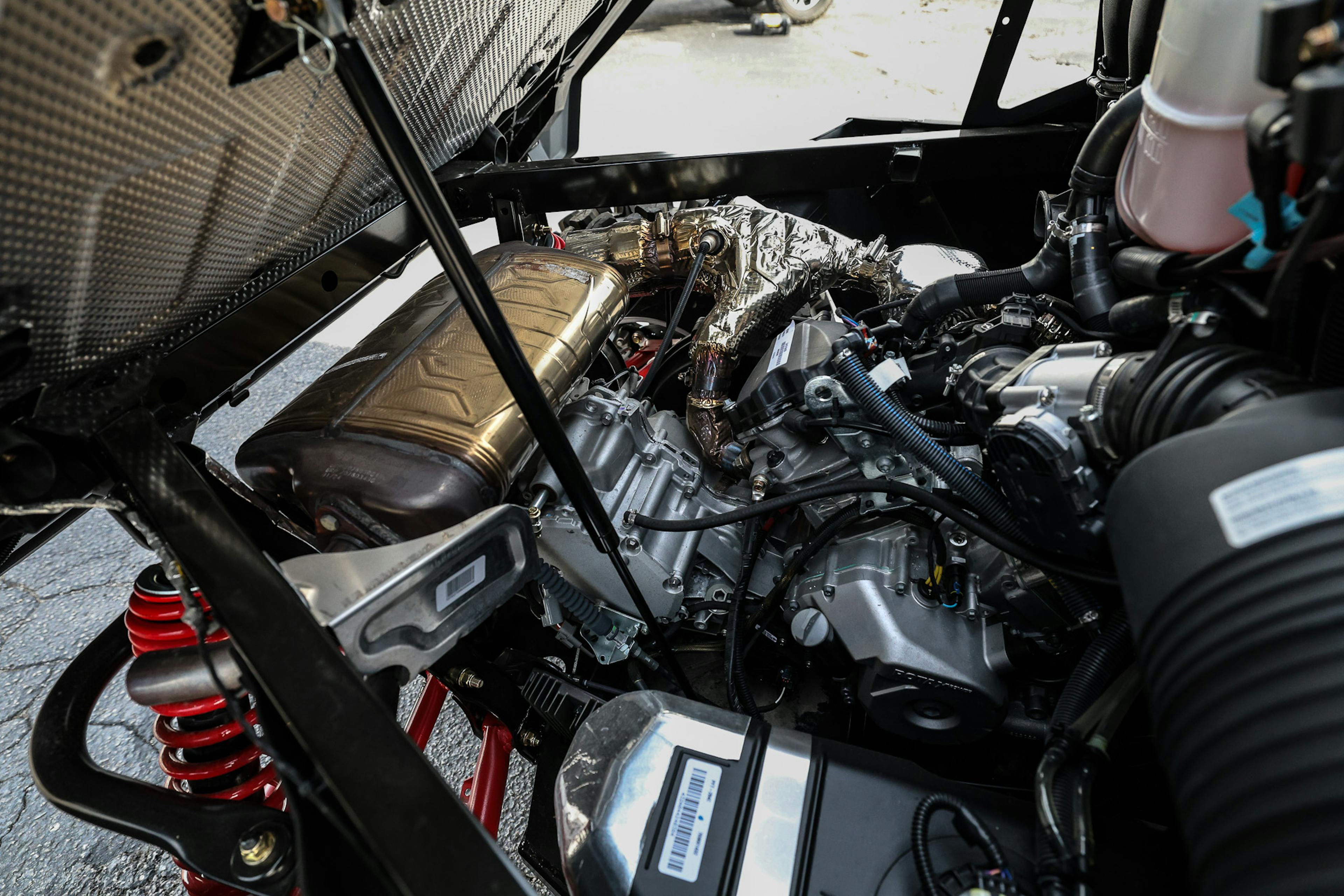 2024 Can-Am Defender HD10 XMR engine from passenger side