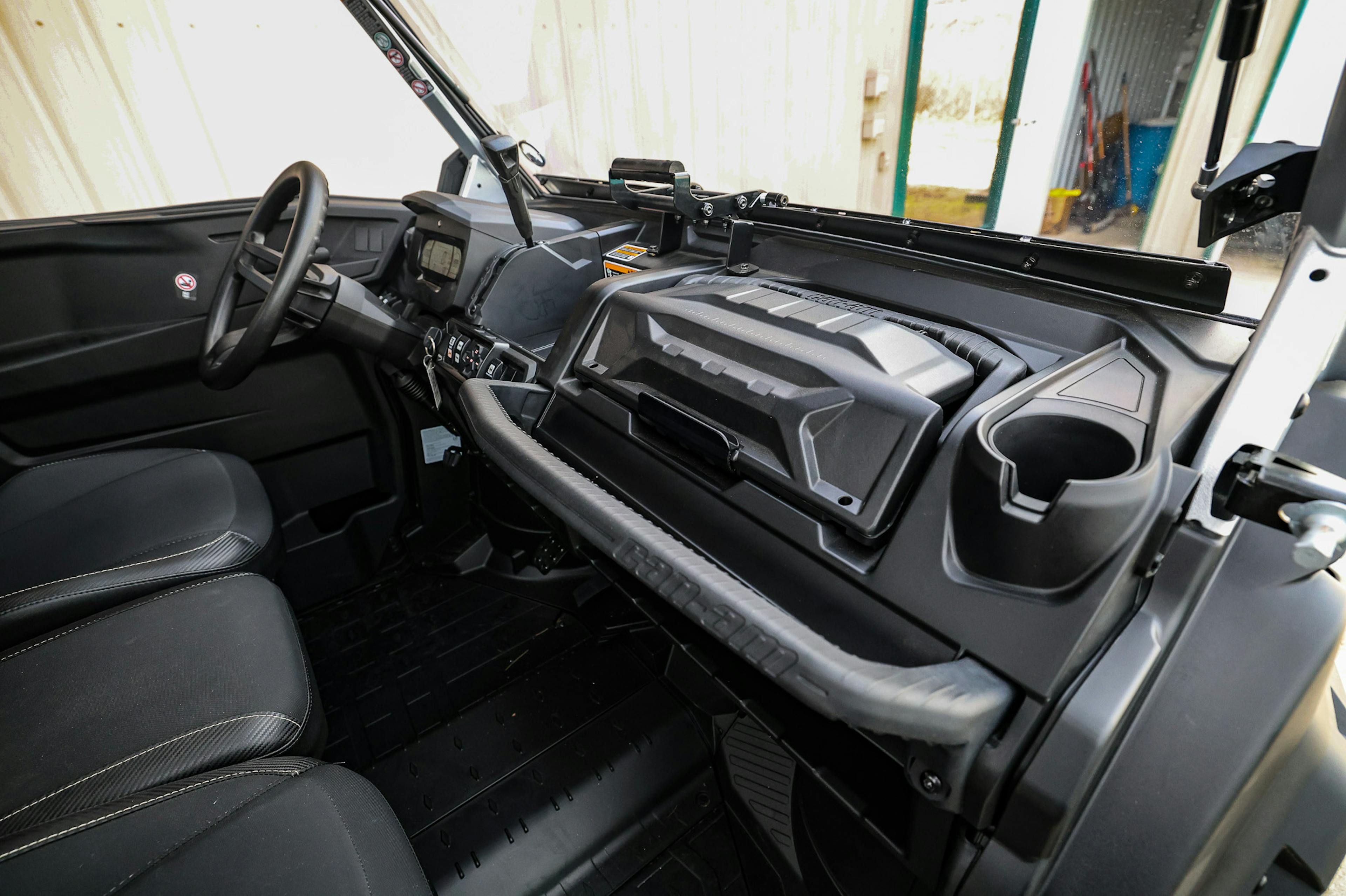 2024 Can-Am Defender HD10 XMR dash from passenger side.