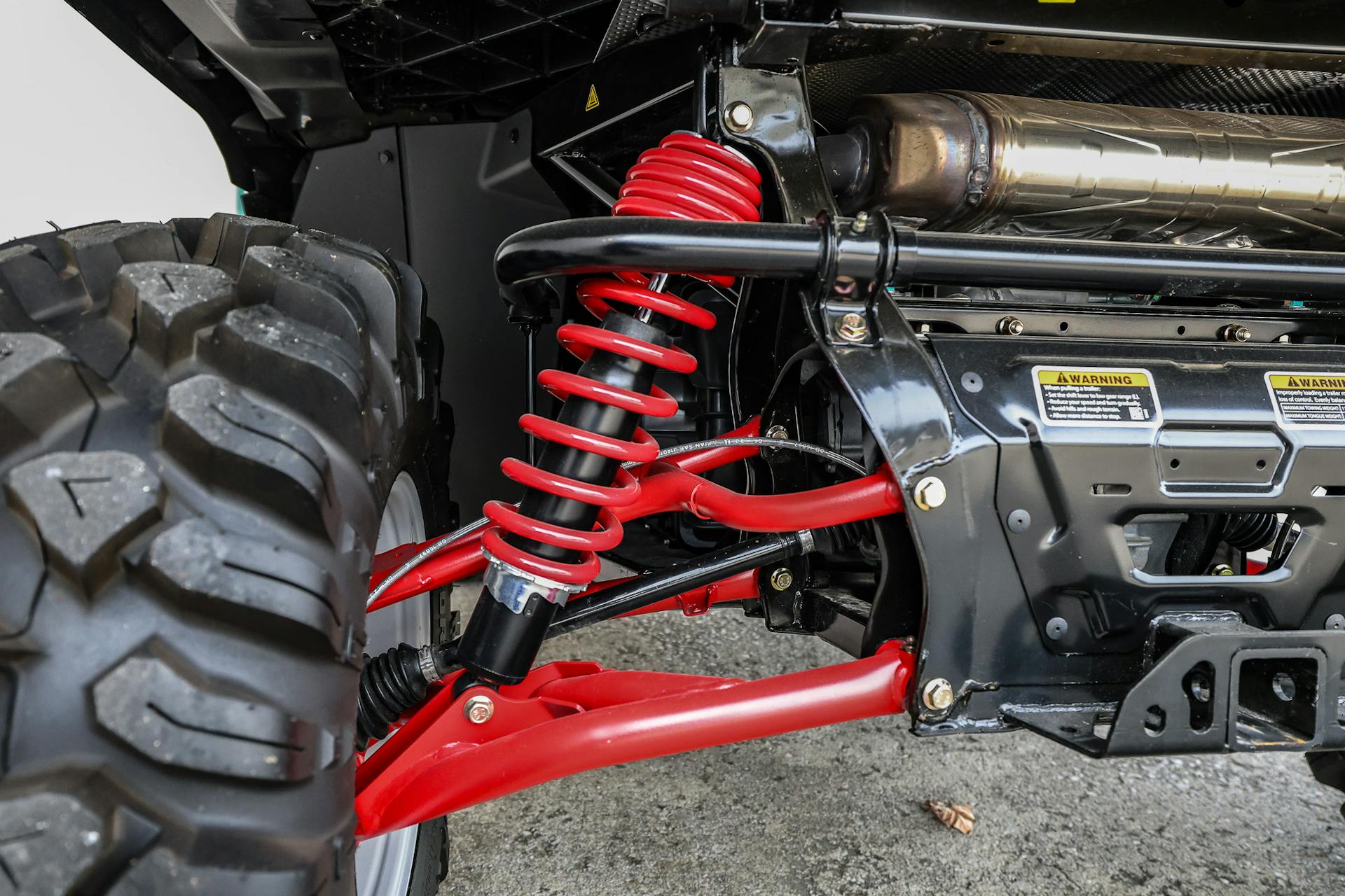 2024 Can-Am Defender HD10 XMR driver rear suspension detail 