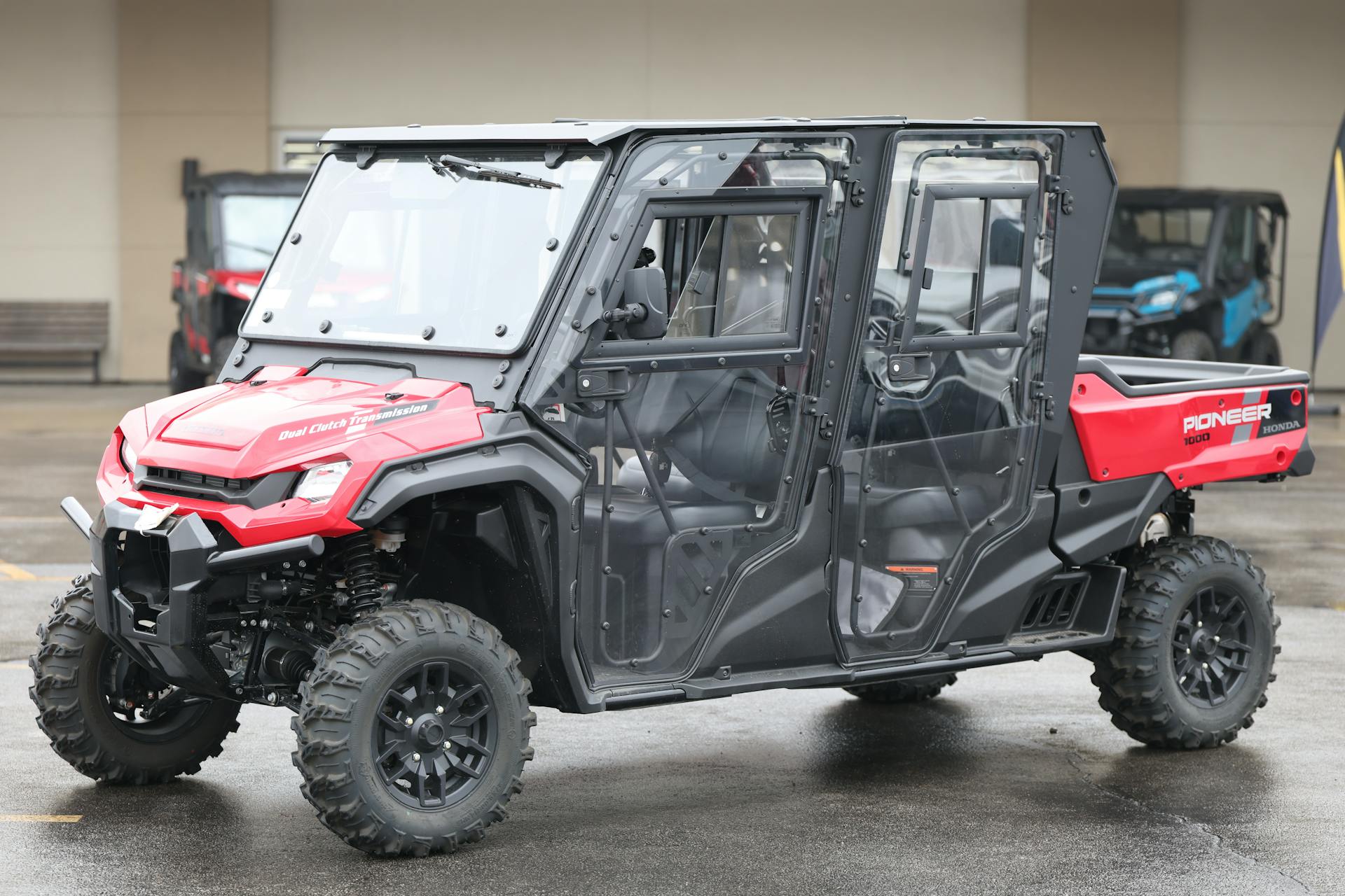 2024 Honda Pioneer 1000-6 DLX driver front 3/4