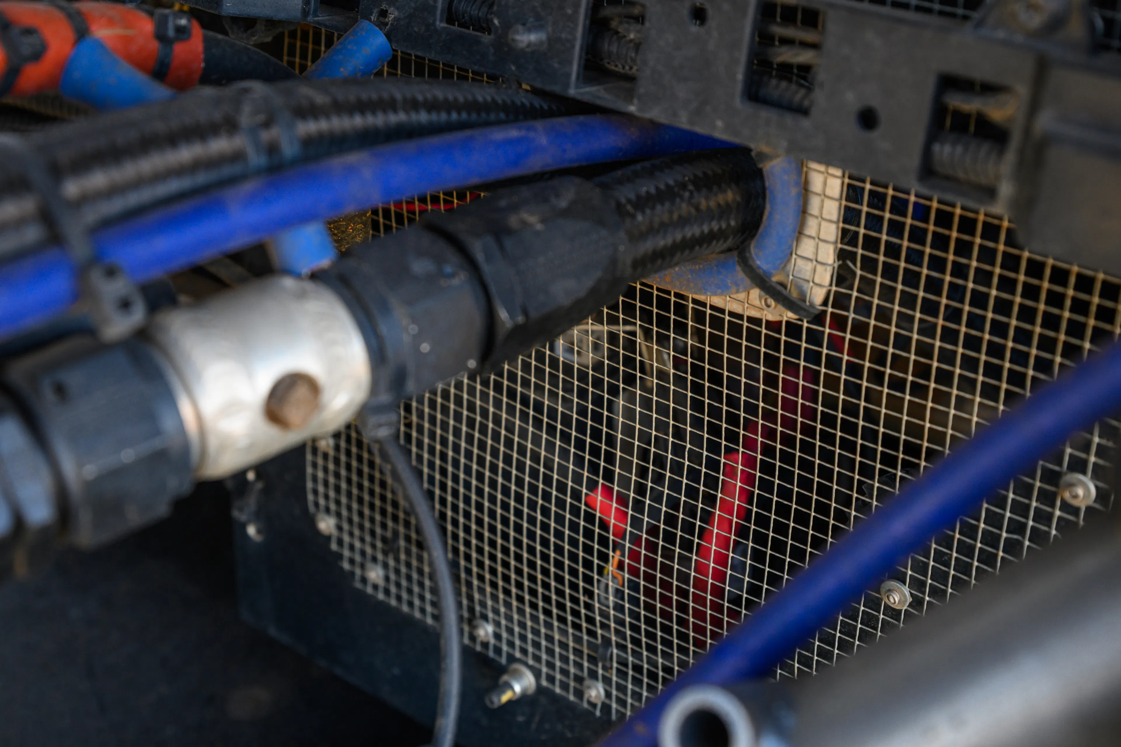 2024 Can-Am Maverick X3 Gray Leadbetter Race Car exterior detail hoses