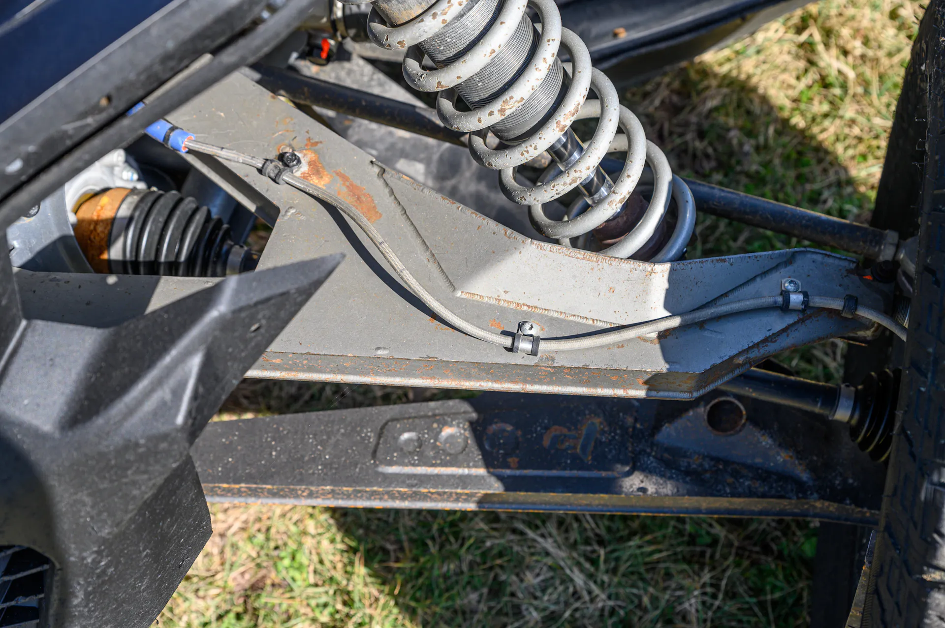 2024 Can-Am Maverick X3 Gray Leadbetter Race Car A-arm detail