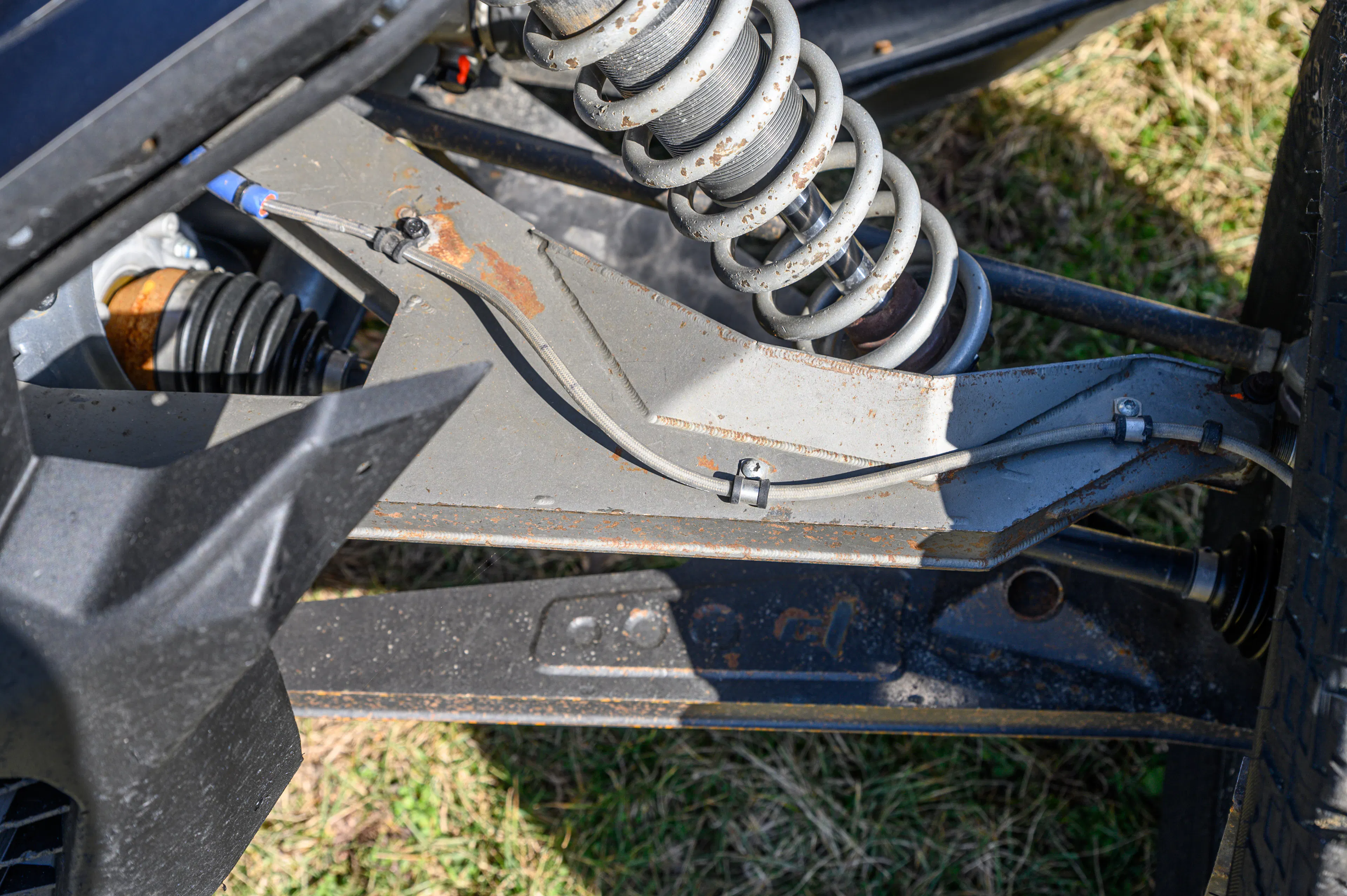 2024 Can-Am Maverick X3 Gray Leadbetter Race Car A-arm detail