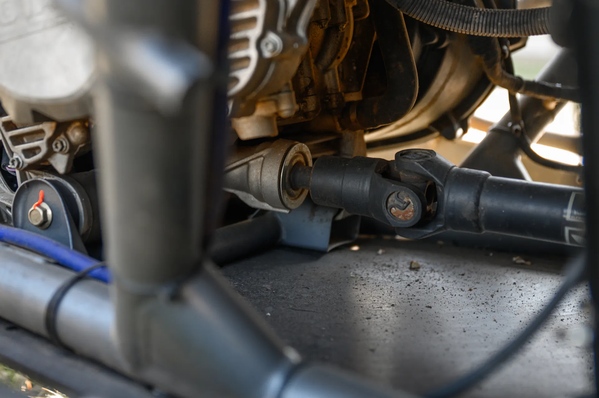 2024 Can-Am Maverick X3 Gray Leadbetter Race Car driveshaft detail