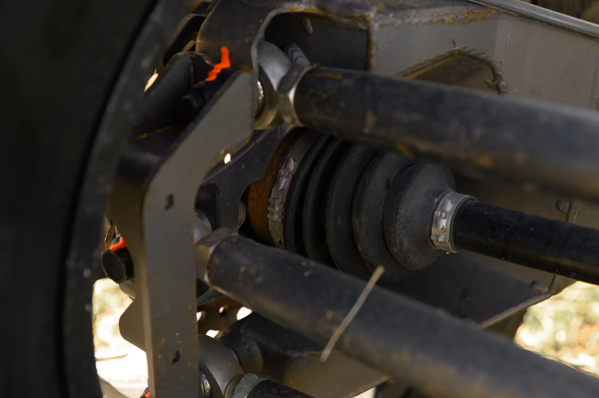 2024 Can-Am Maverick X3 Gray Leadbetter Race Car rear axle close