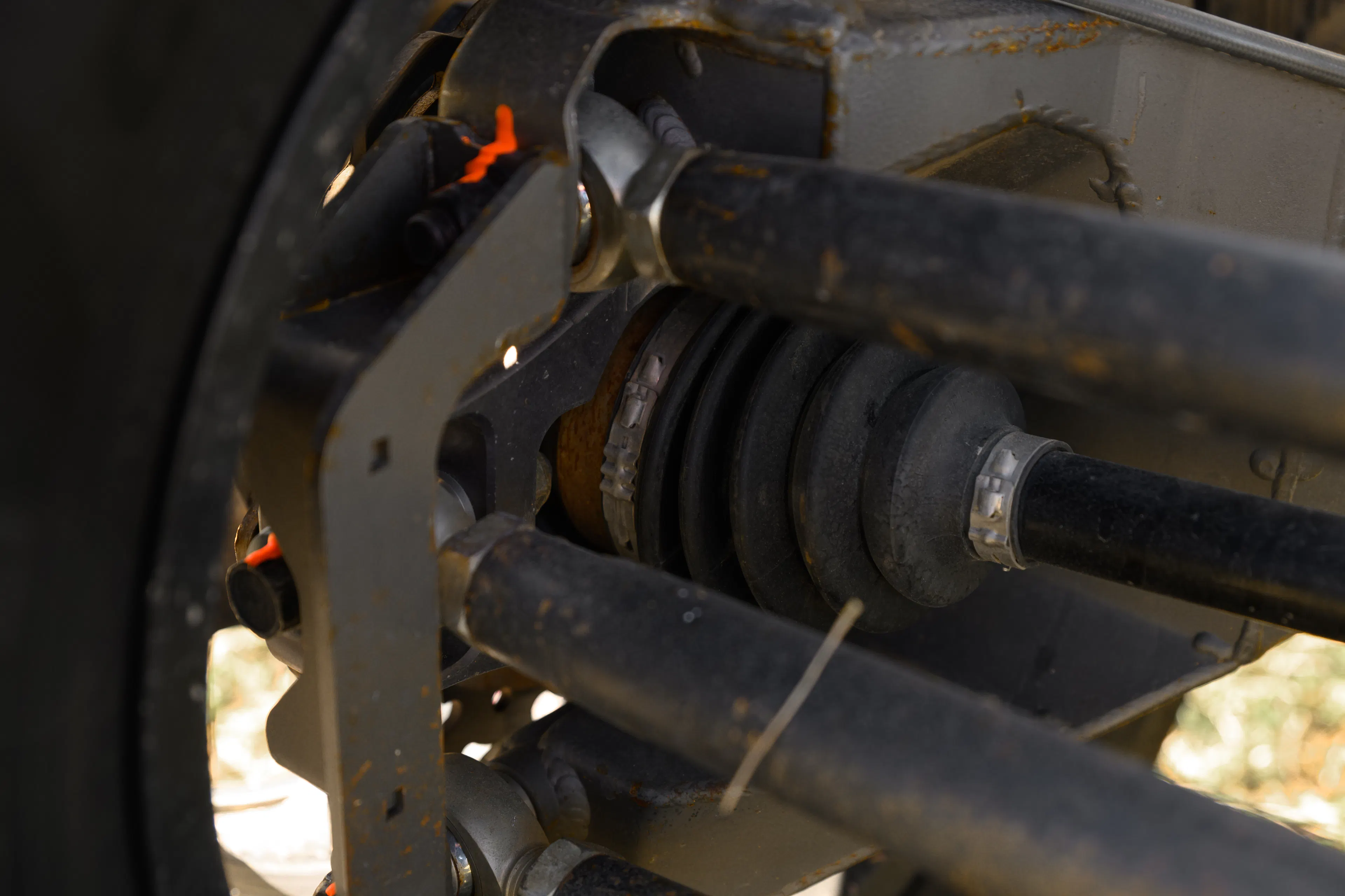 2024 Can-Am Maverick X3 Gray Leadbetter Race Car rear axle close