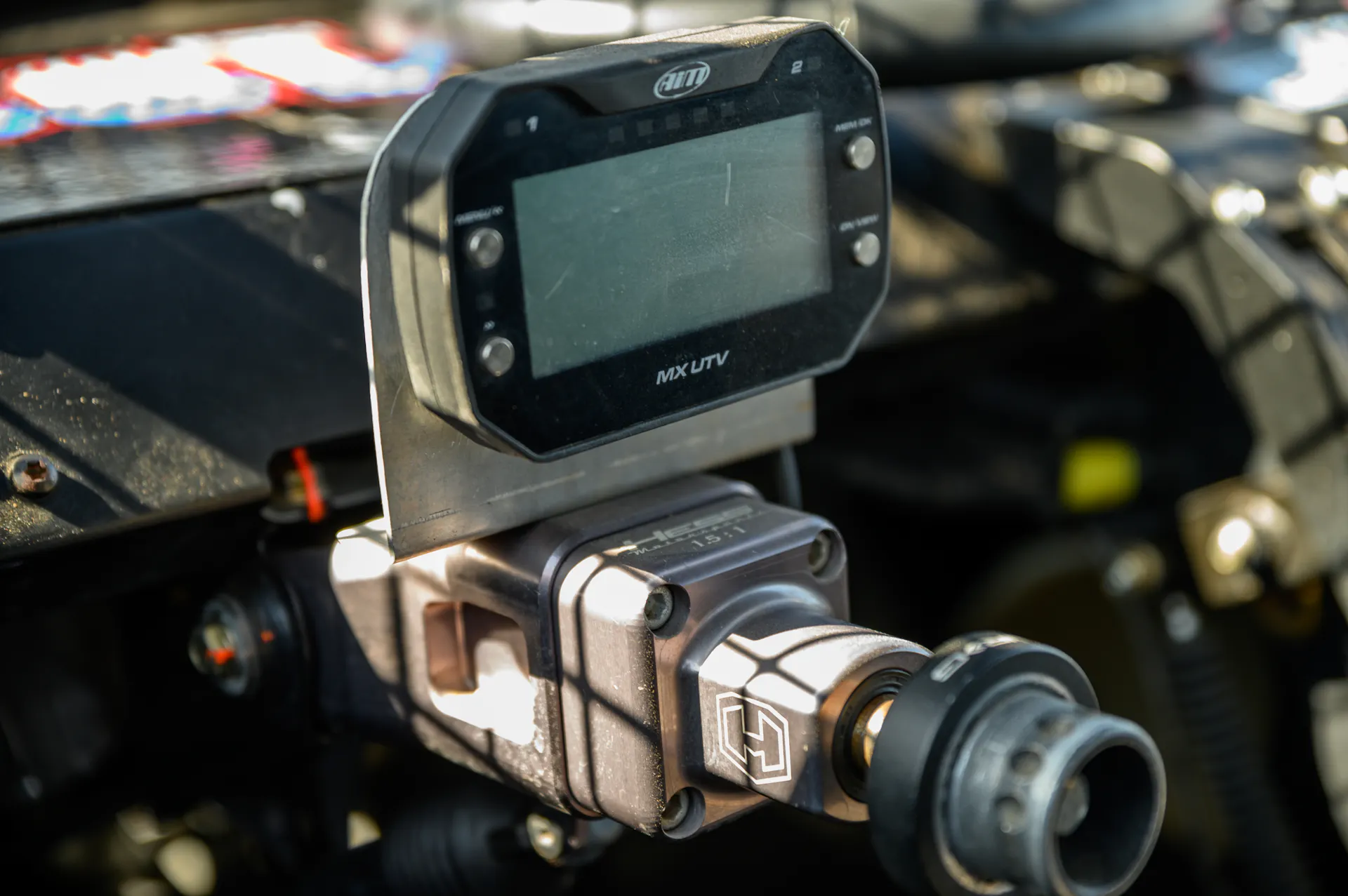 2024 Can-Am Maverick X3 Gray Leadbetter Race Car interior column/gauges up close