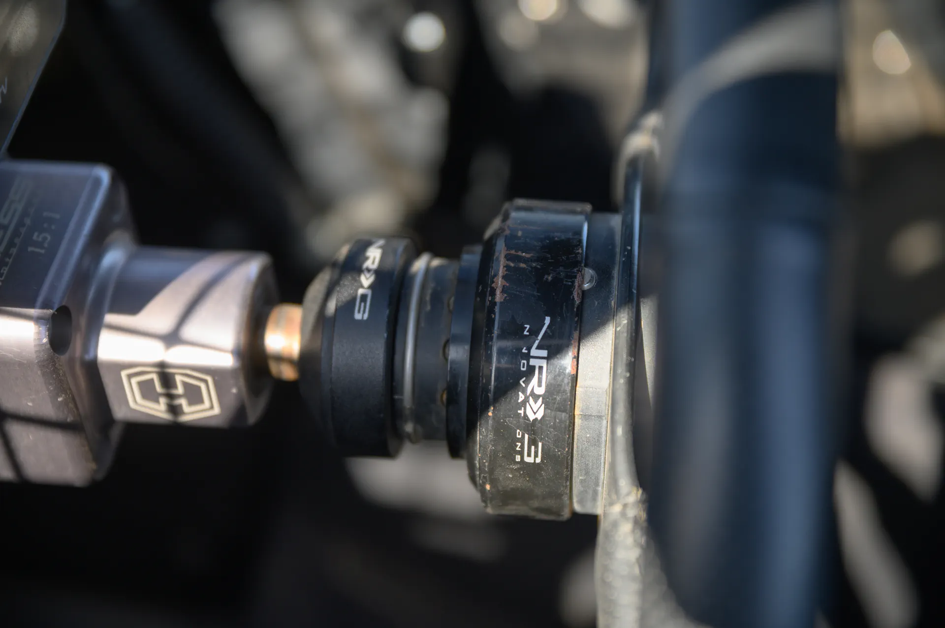 2024 Can-Am Maverick X3 Gray Leadbetter Race Car interior quick disconnect detail