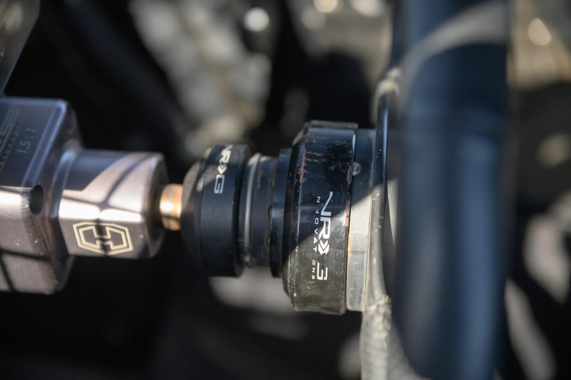 2024 Can-Am Maverick X3 Gray Leadbetter Race Car interior quick disconnect detail