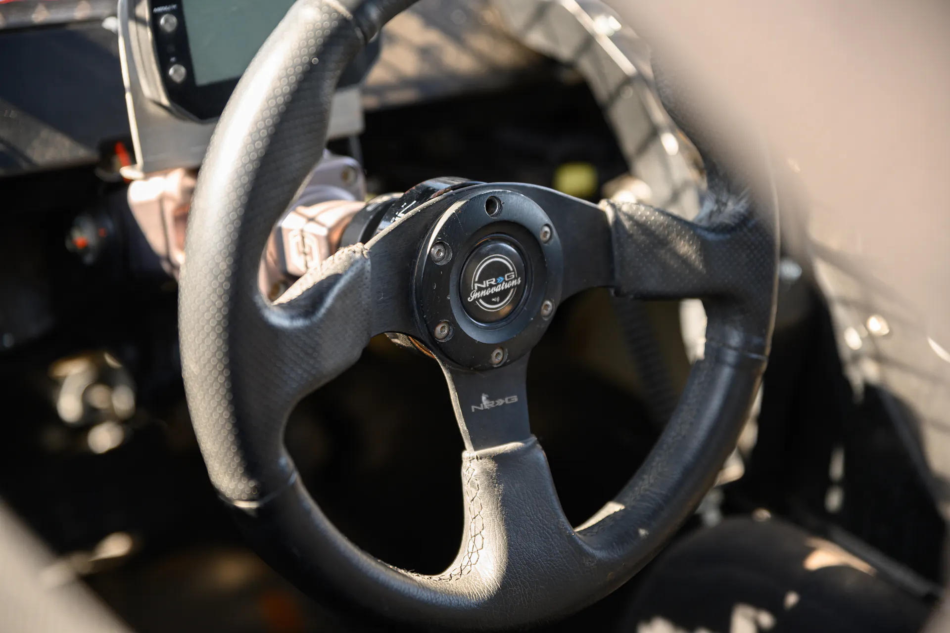 2024 Can-Am Maverick X3 Gray Leadbetter Race Car interior wheel close