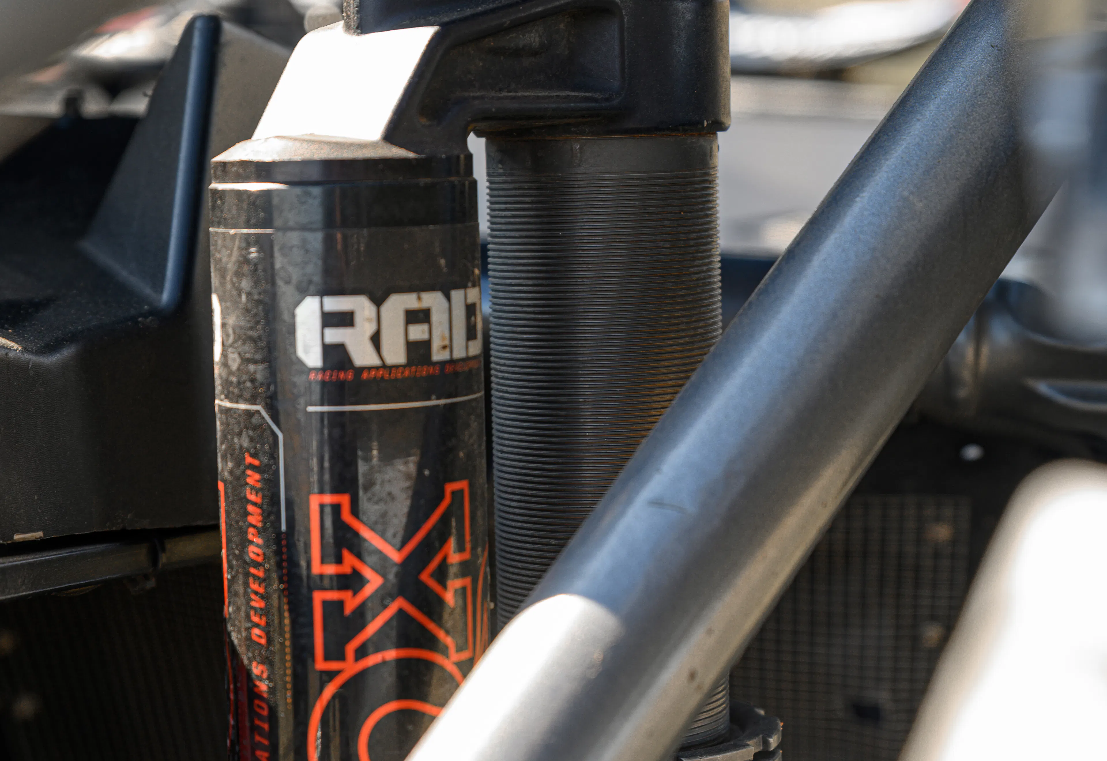 2024 Can-Am Maverick X3 Gray Leadbetter Race Car exterior detail  Fox reservoir 2