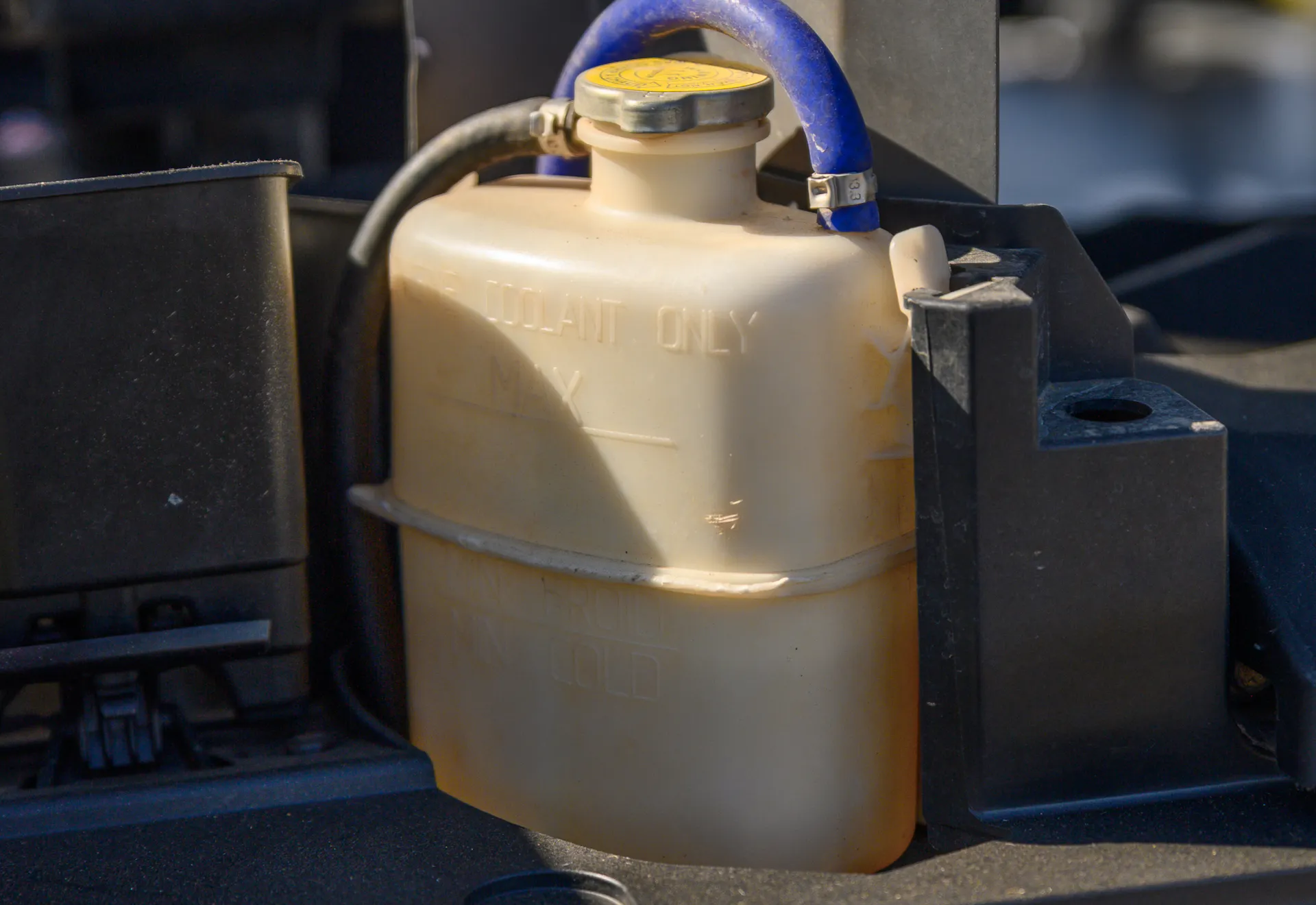 2024 Can-Am Maverick X3 Gray Leadbetter Race Car exterior detail coolant overflow