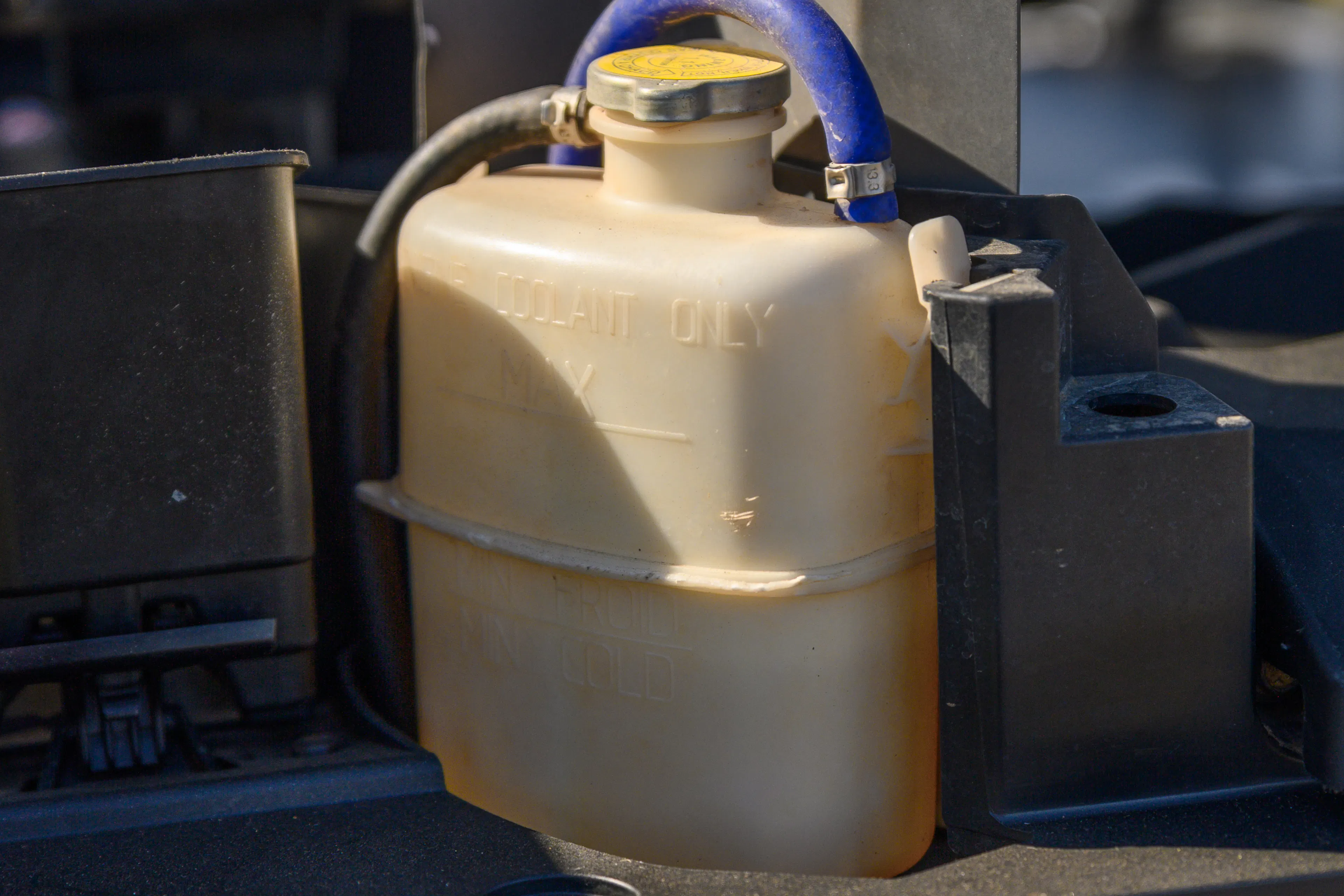 2024 Can-Am Maverick X3 Gray Leadbetter Race Car exterior detail coolant overflow