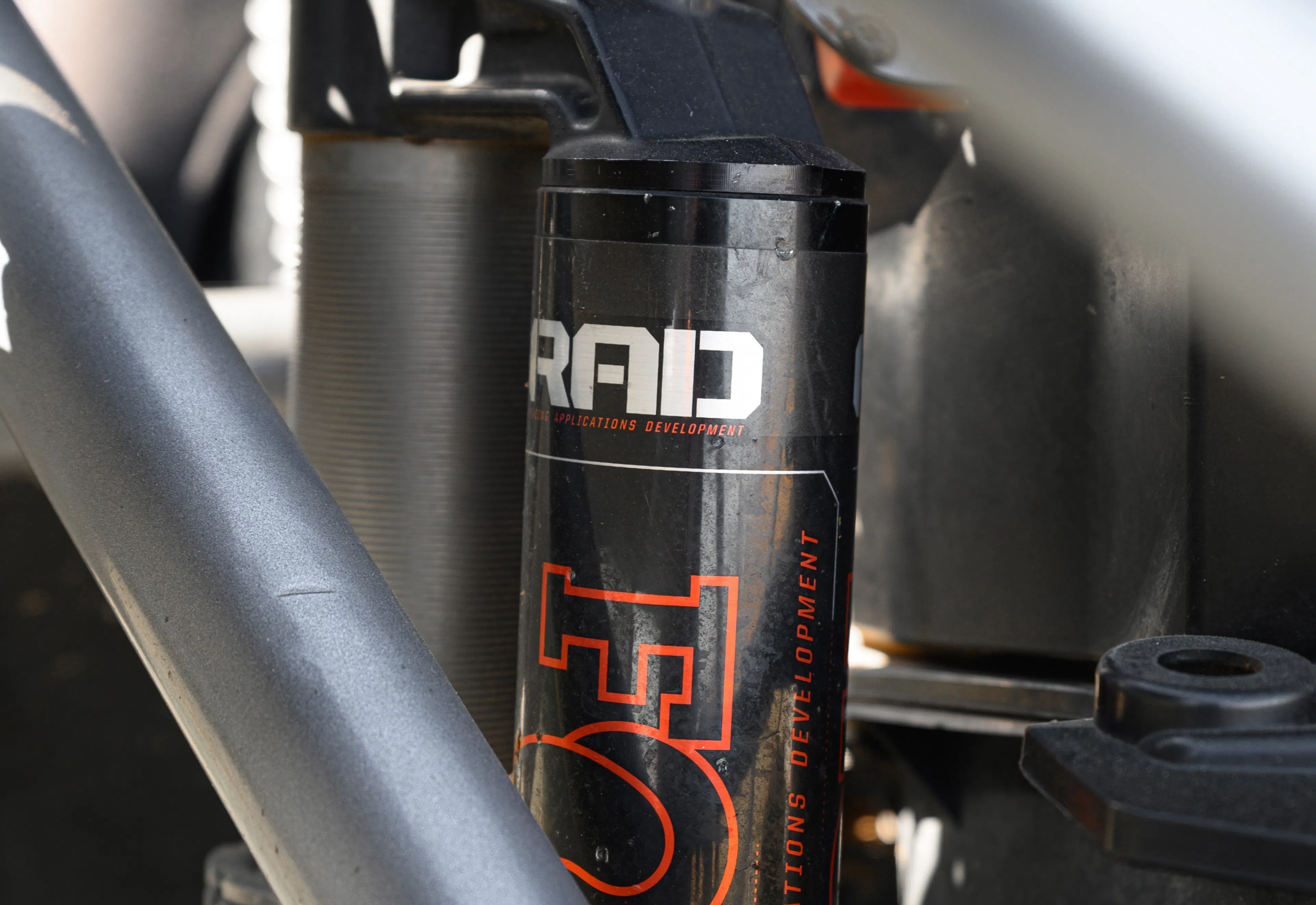 2024 Can-Am Maverick X3 Gray Leadbetter Race Car exterior detail  Fox reservoir 1