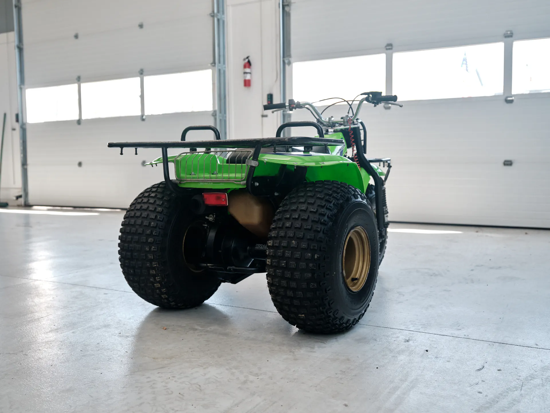 1985 Kawasaki KLT 250 right rear 3/4 distance