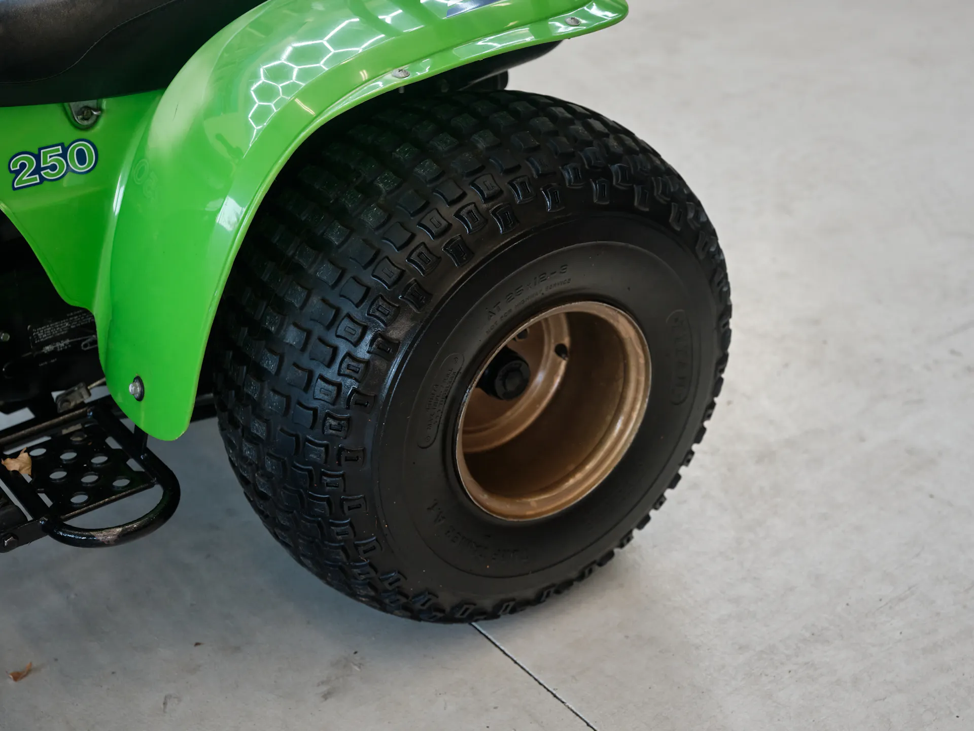 1985 Kawasaki KLT 250 left rear tire high angle front