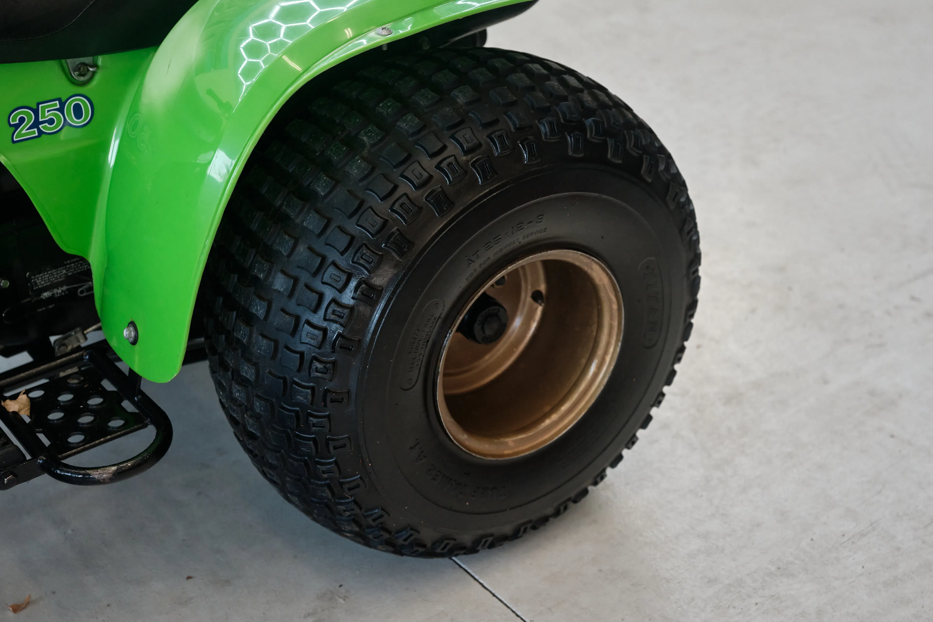 1985 Kawasaki KLT 250 left rear tire high angle front