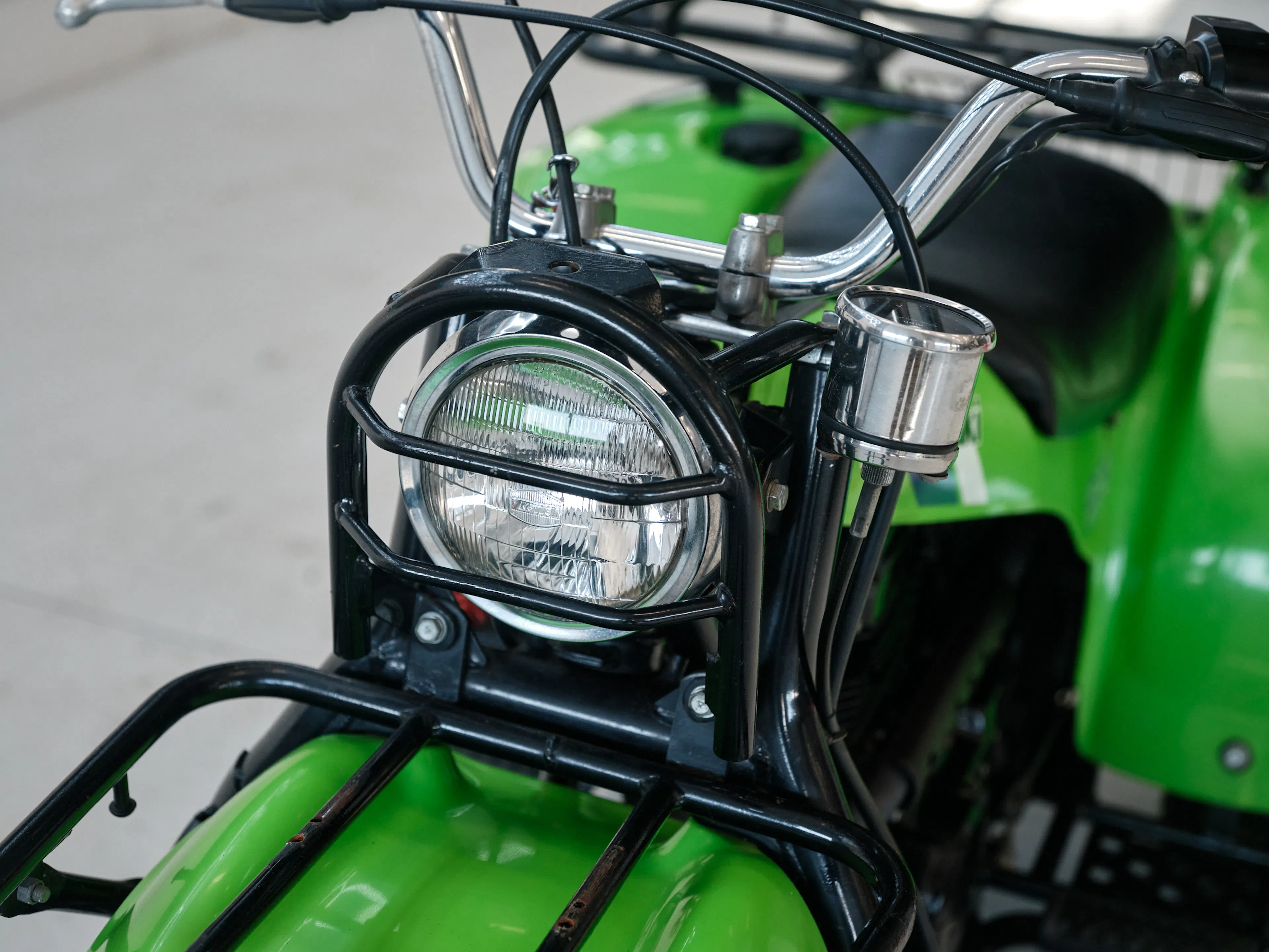 1985 Kawasaki KLT 250 headlight close