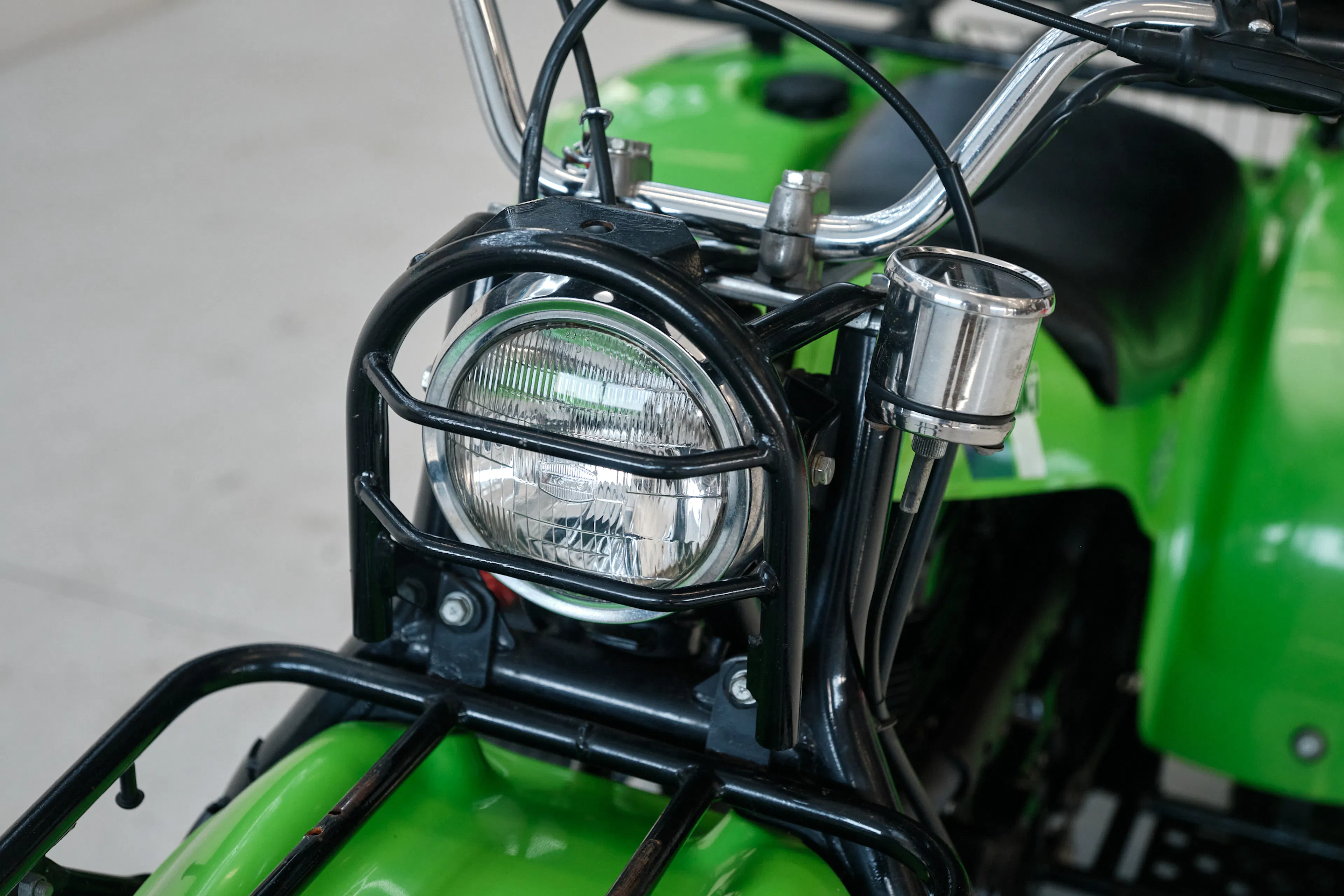 1985 Kawasaki KLT 250 headlight close