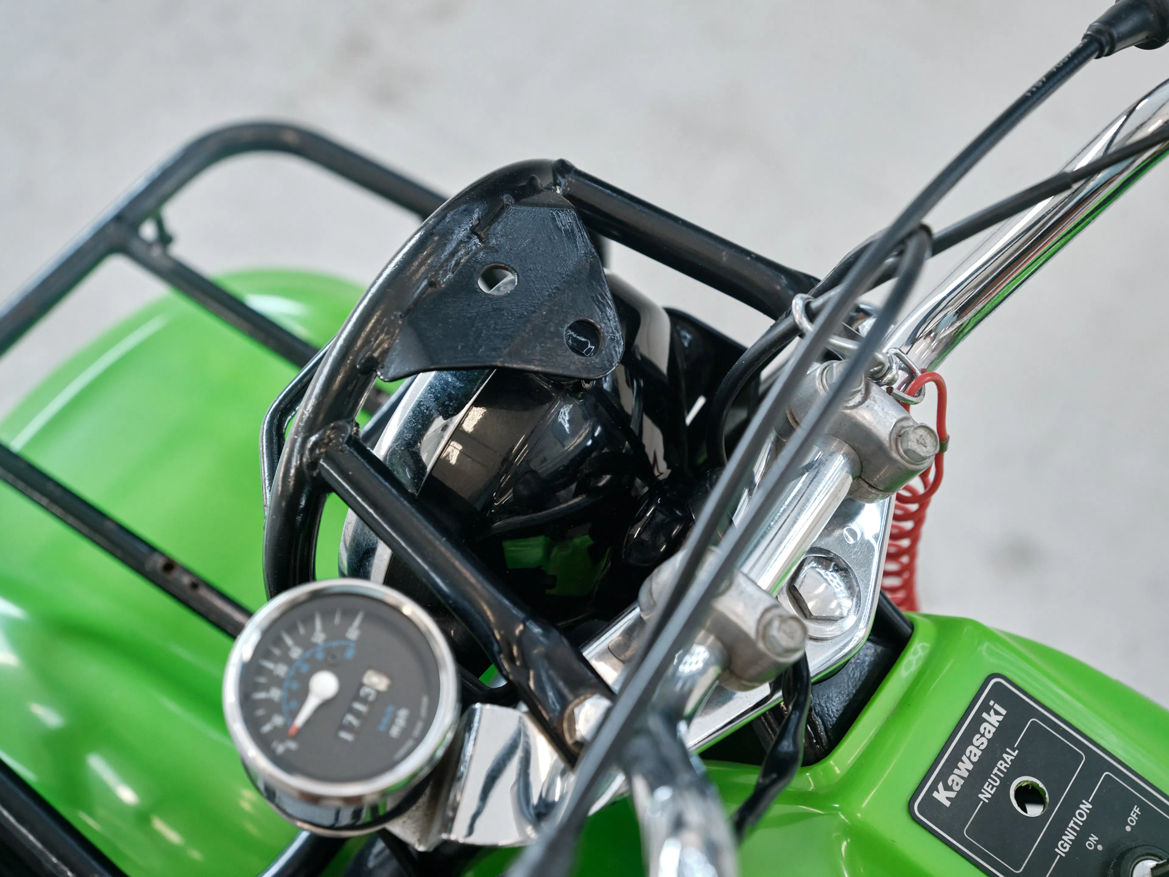 1985 Kawasaki KLT 250 speedometer/headlight cage