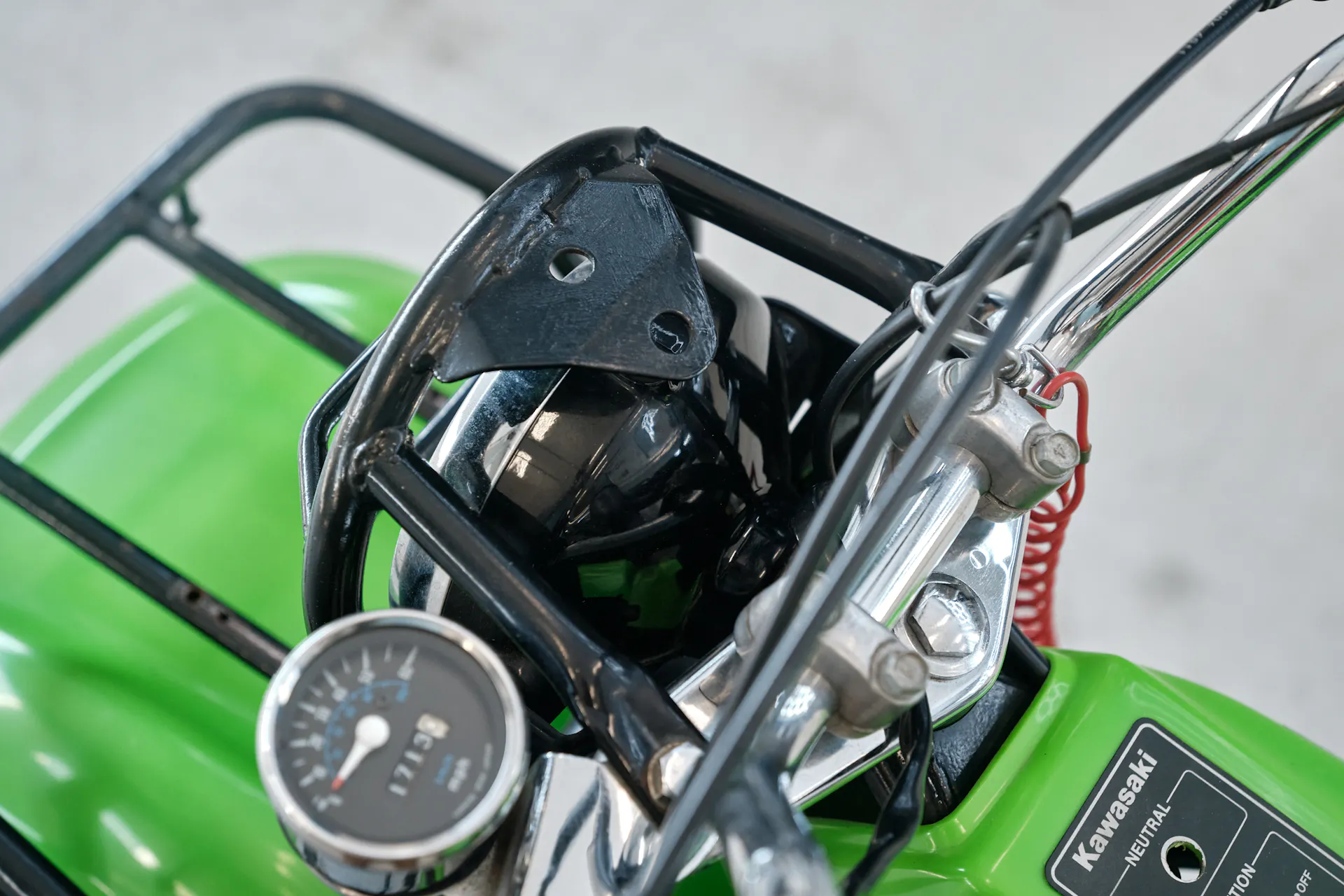 1985 Kawasaki KLT 250 speedometer/headlight cage