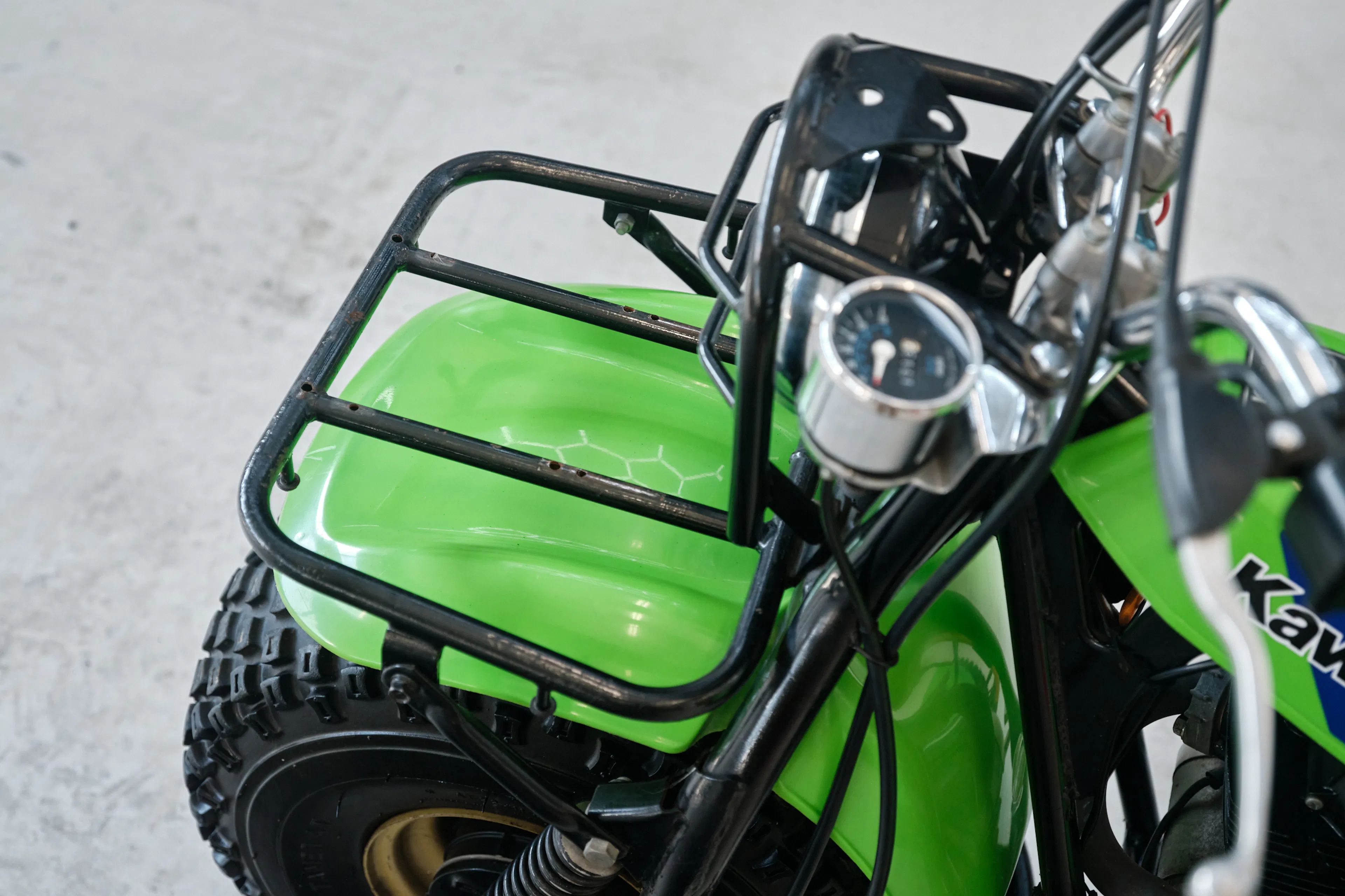 1985 Kawasaki KLT 250 gauges/front rack