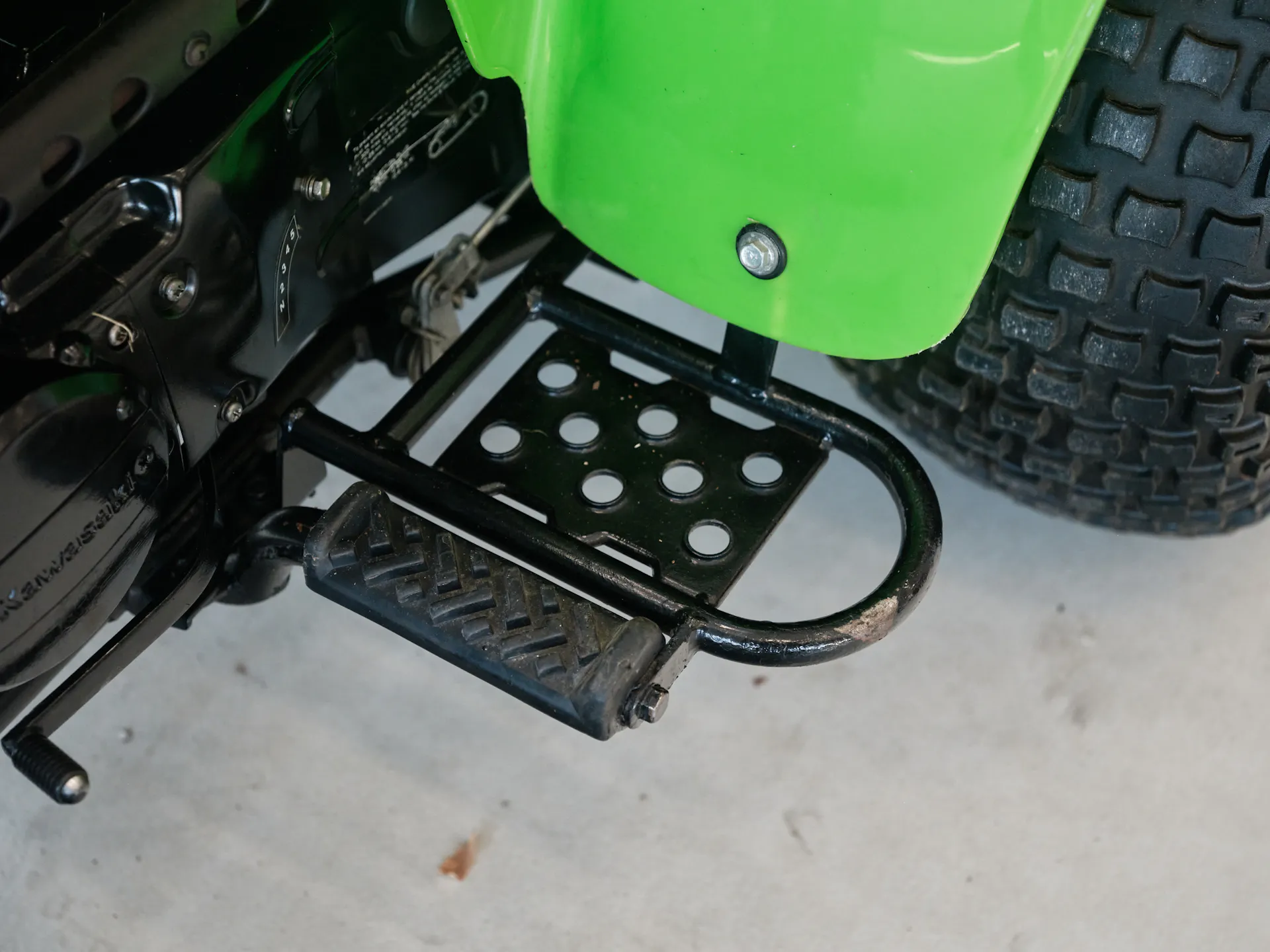 1985 Kawasaki KLT 250 left floorboard 