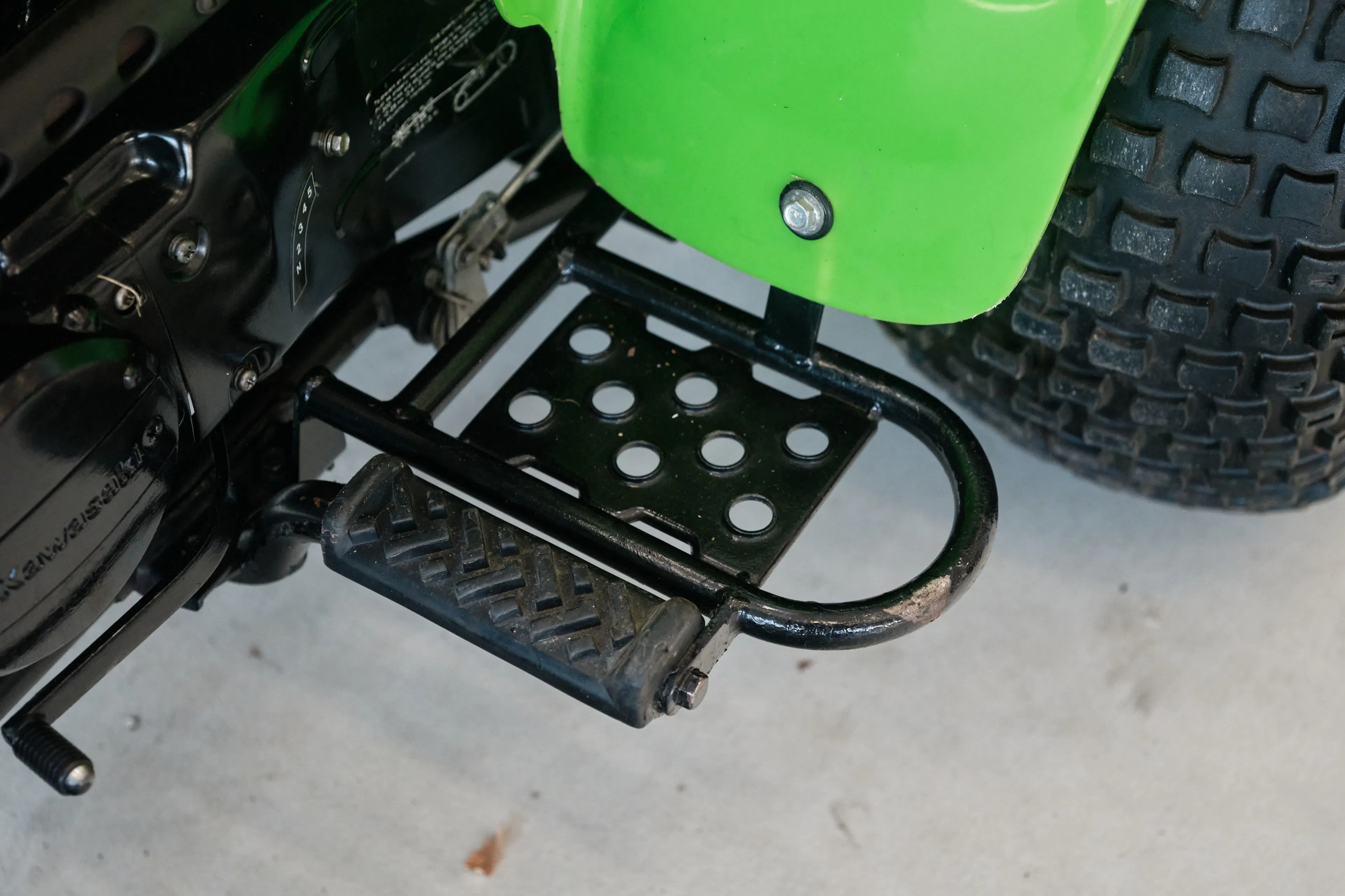 1985 Kawasaki KLT 250 left floorboard