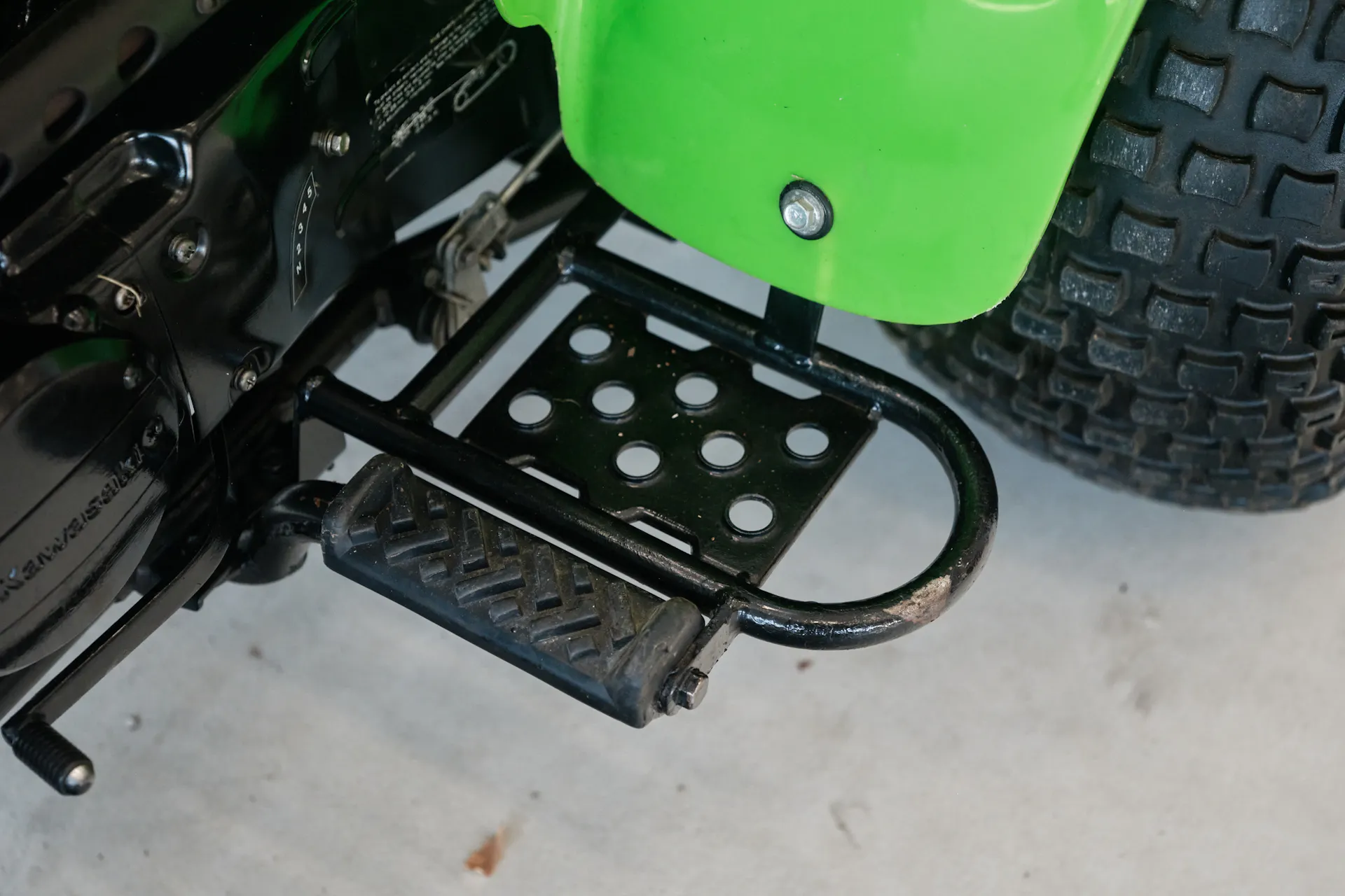 1985 Kawasaki KLT 250 left floorboard