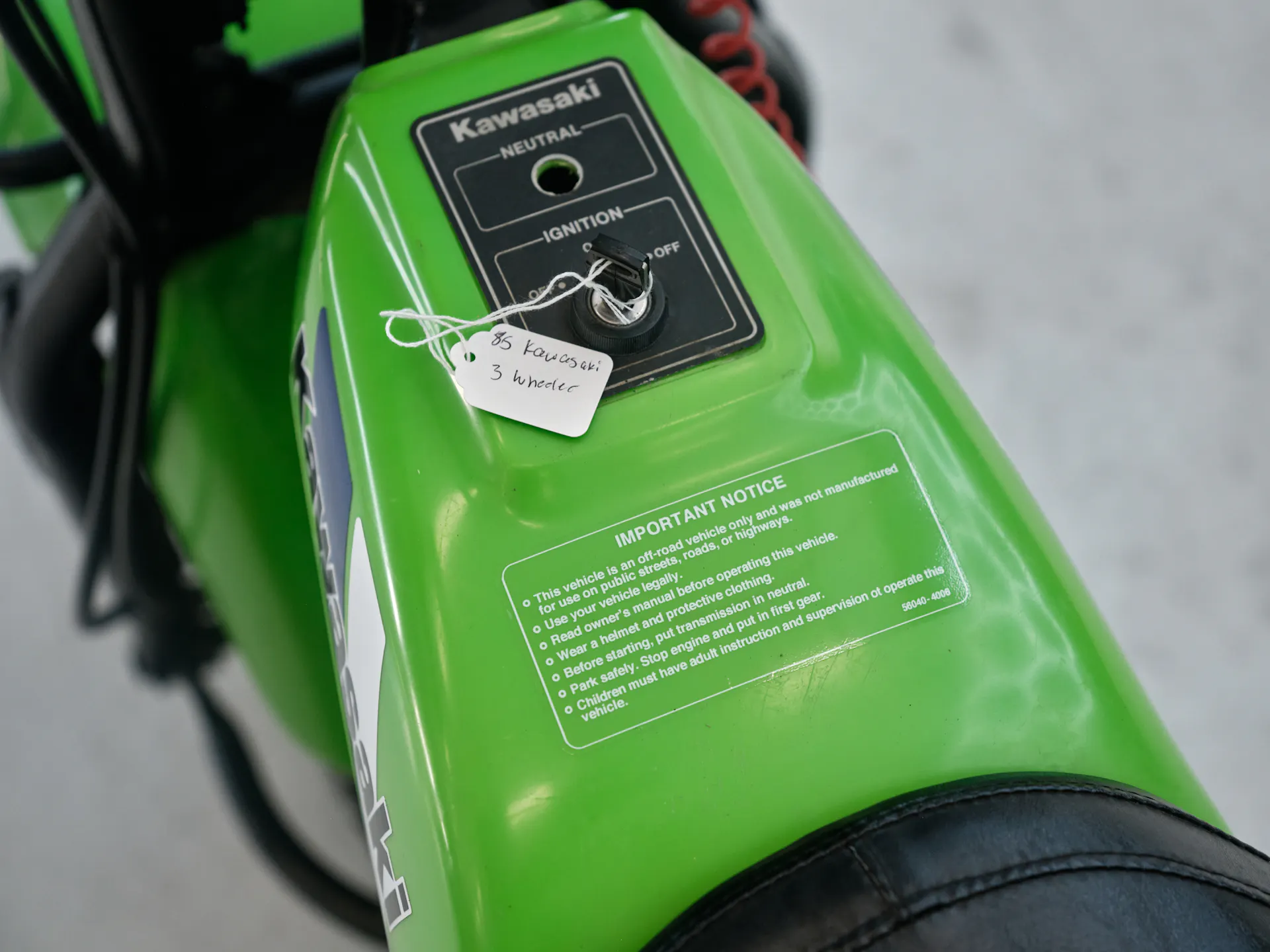 1985 Kawasaki KLT 250 warning stickers close