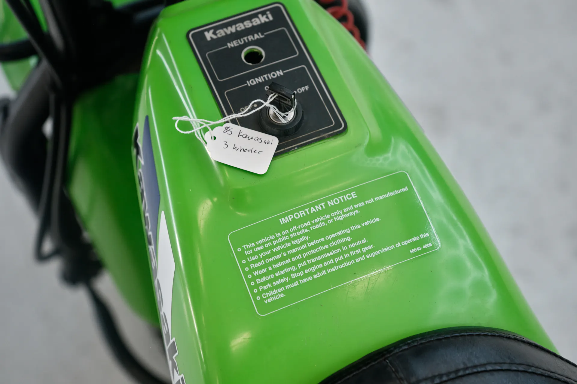 1985 Kawasaki KLT 250 warning stickers close